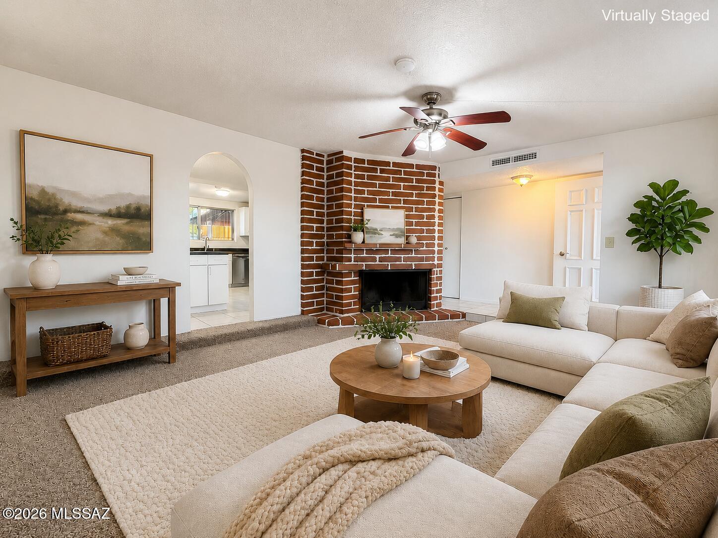 Spacious home on a large lot with beautifully maintained, easy-care front and backyard landscaping. The backyard features a partially in-ground above-ground pool with surrounding deck, covered patio with ceiling fan, fenced garden area ready for flowers or vegetables, citrus trees, mature pine tree providing afternoon shade, and two large storage sheds offering excellent storage or workspace options. Wide gate allows vehicle access to the backyard. Inside, the kitchen includes a large island, stainless Frigidaire range and refrigerator, Maytag dishwasher, and abundant space for entertaining. Skylights brighten the dining area and both bathrooms. Newer carpet, ceramic tile, ceiling fans, dual cooling, fireplace, and large utility room add comfort and flexibility throughout the home