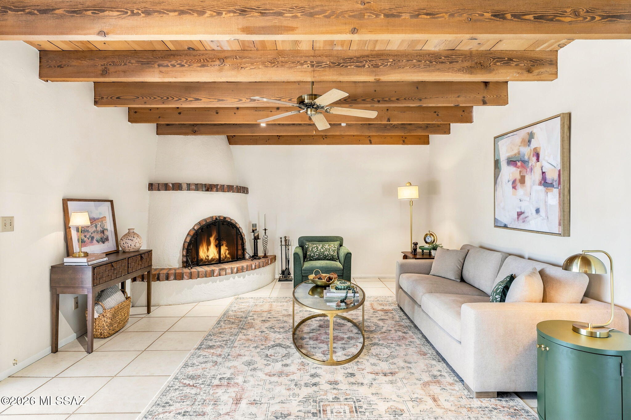 Seller will accept or counter offers between $585,990.- $610,000. Welcome to your Catalina Foothills Oasis!This home sits on .748 acres, with spectacular views of the desert, mountains, sunrise, and sunsets. The owner has carefully planted more than 20 native trees and desert shrubs, creating a thriving habitat that attracts birds, pollinators, and other native species. A welcoming courtyard entry invites you into the heart of the home. Inside, sliding glass doors in multiple rooms fill the home's interior with an abundance of natural light. The kitchen is light and open, flowing seamlessly into a cozy family room with exposed-beam ceilings and a wood-burning beehive fireplace. The rear of the home has a large, extended, covered back patio and an inviting pool. The yard is snake-proofed with an outdoor predator-proof kennel to keep your small pets safe. Ideally located on a low traffic, quiet street near Sabino Canyon, hiking trails, restaurants, grocery stores, specialty shops, and schools, this home offers both serenity and convenience. Be sure to review the list of recent owner improvements!