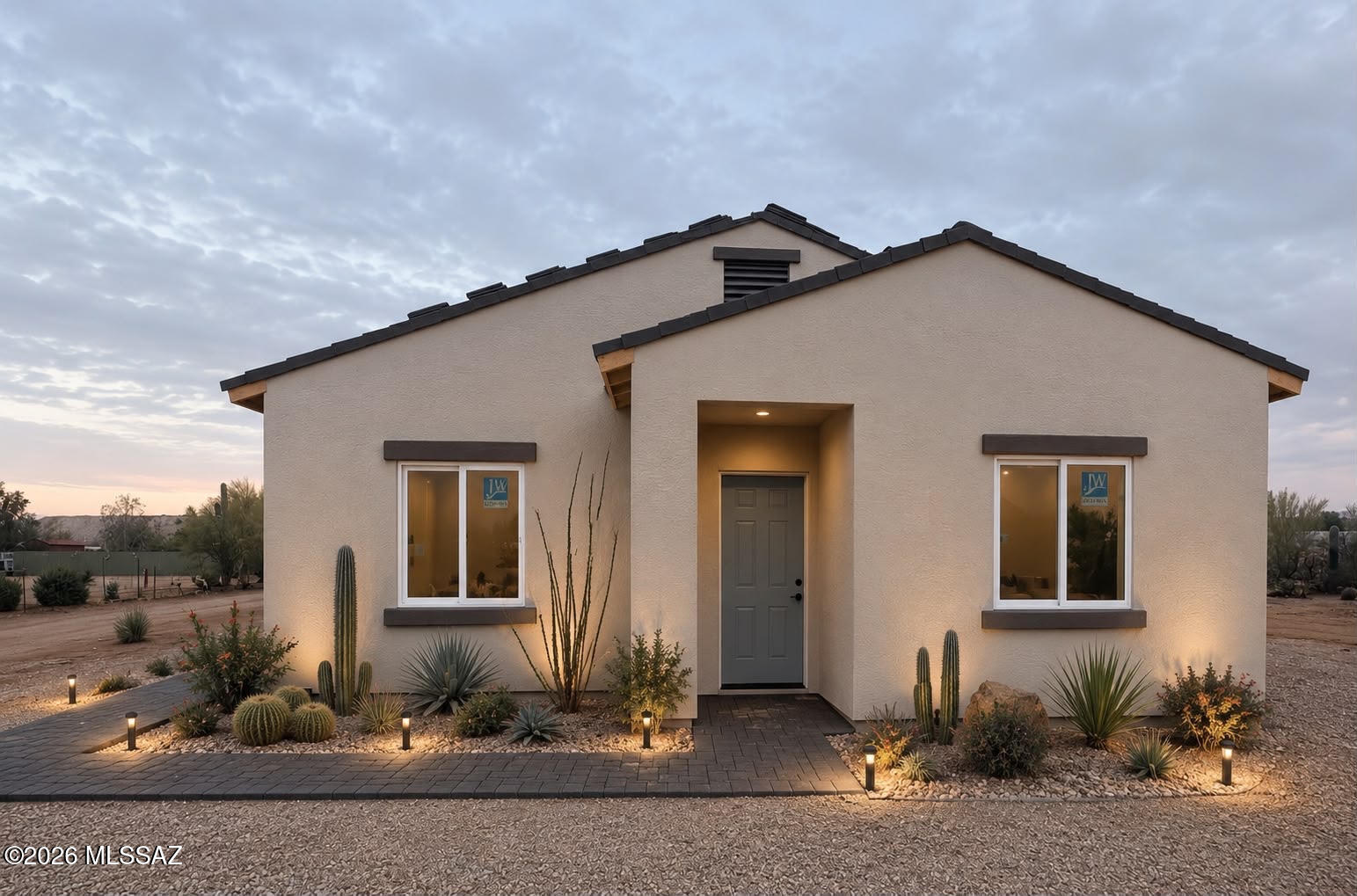 Brand new construction on a beautiful 1 acre lot in the heart of Picture Rocks with no HOA! Enjoy the freedom of rural living with plenty of space for horses, RVs, trailers, and all your outdoor toys. This thoughtfully designed home features modern finishes, an open concept floor plan, and quality craftsmanship throughout.
Surrounded by the natural beauty of the Sonoran Desert, you'll enjoy breathtaking mountain views, spectacular sunsets, and dark skies perfect for stargazing. Located just minutes from Saguaro National Park West, this property offers the peace and privacy of country living while remaining conveniently close to shopping, dining, and easy access to I-10. Whether you're looking for space to spread out or a peaceful desert retreat without sacrificing modern comforts, this new construction home offers the best of Arizona living.