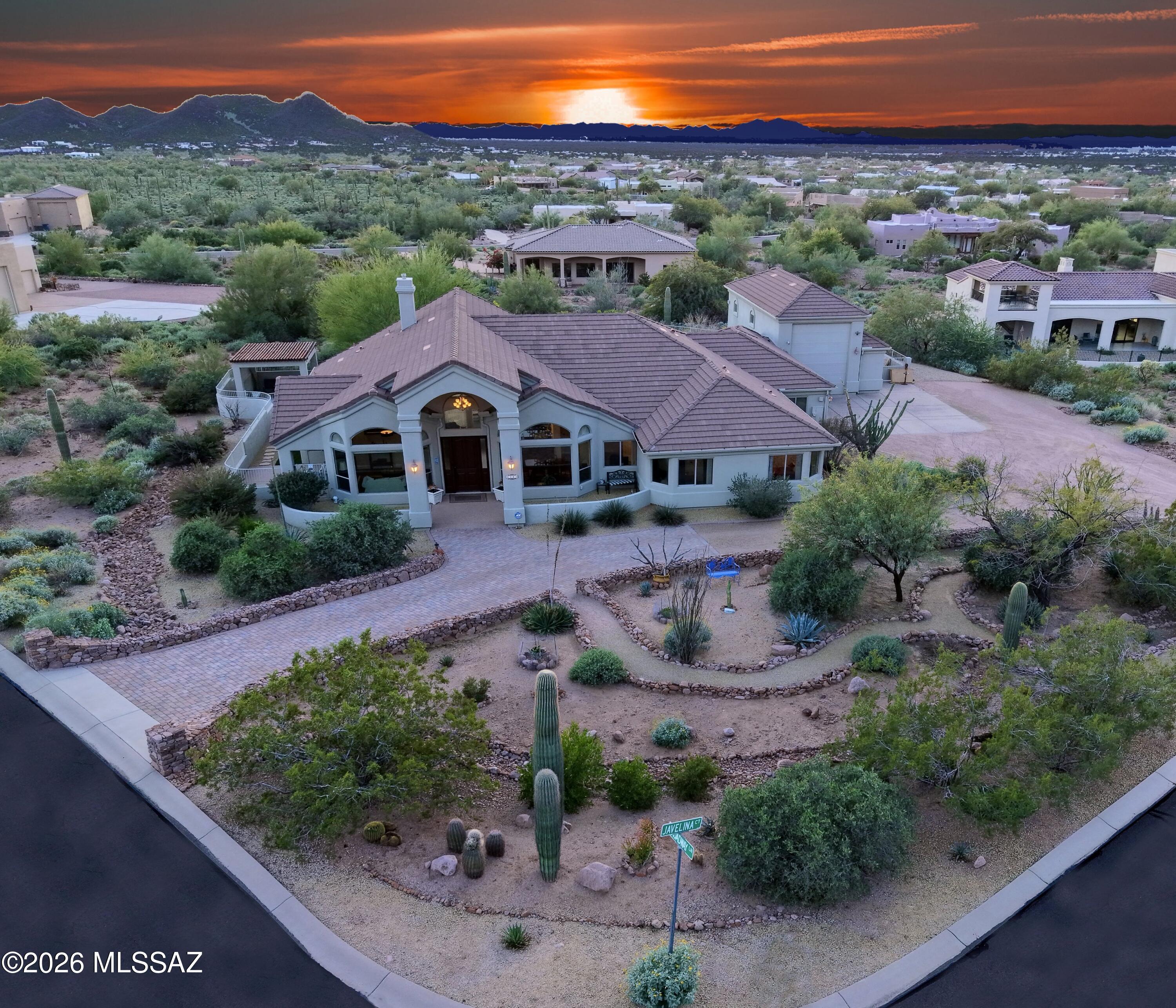 Unmatched Superstition Mountain Views
Wake up each day to breathtaking views of the iconic Superstition Mountains, glowing desert sunsets, and sparkling city lights from this exceptional custom home in the prestigious Superstition Highlands community. Positioned on a private 1.03-acre corner cul-de-sac lot at the base of the mountains, this property was designed to fully embrace Arizona's stunning desert scenery from nearly every angle.
Property Highlights:
• 16x40 RV Garage with hookups & dump
• Oversized 3-Car Garage + Workshop
• Circular Driveway
• Working Gas Fireplace
• Integrated security and whole-home technology features
• Prewired for surround sound, satellite, cable & connectivity infrastructure
• Fenced Backyard with Gazebo & Room for Pool
More. On 1+ Acre at corner of a Cul-de-Sac entry with Panoramic Mountain & City Light Views; Surrounded by the natural beauty of the Tonto National Forest, this beautifully maintained 2,803 sq ft custom residence offers 4 bedrooms, 2.5 bathrooms, expansive picture windows, and open-concept living spaces thoughtfully designed to frame the dramatic mountain backdrop throughout the home.
Blending comfort, functionality, and luxury desert living, the property includes an oversized 3-car garage with a connected 12x12 workshop, plus a rare 16x40 RV garage featuring a 16-foot ceiling, 12x14 door, 50/30 amp hookups, and dump station. Additional features include gated toy/trailer parking, a large laundry room, soft water loop, RO system, dedicated storage room, and abundant built-in storage throughout. The patio furniture & LR and custom bookcase built to fit the wall convey.
The outdoor living spaces were carefully planned to maximize the surrounding mountain and desert views while offering low-maintenance living and future flexibility. The backyard features turf, a spa-ready wired and plumbed gazebo, grill area, large covered patio, private mountain-view courtyard, and ample room to add a custom pool.
One of the property's most remarkable features is the meticulously curated desert landscaping. Hundreds of indigenous desert plants, mature cacti, and native trees create a refined Sonoran Desert setting that blends seamlessly into the surrounding protected landscape and mountain terrain.
Located in one of Gold Canyon's most sought-after luxury communities, this home offers a rare combination of panoramic mountain views, privacy, acreage, RV accommodations, and convenient access to modern amenities. Enjoy nearby hiking, biking, horseback riding, golf, lakes, shopping, restaurants, medical facilities, and quick access to Phoenix and Mesa airports via the US-60.
Community Highlights:
" Panoramic Superstition Mountain views
" Sparkling city lights and desert sunsets
" Surrounded by Tonto National Forest
" Nearby hiking, biking & horseback trails
" Close proximity to Canyon Lake & Saguaro Lake
" Multiple golf courses nearby
" Quiet custom home community
" Low HOA fees
" Convenient access to shopping, dining & airports
Included with the home: all appliances, washer & dryer, and all window coverings except bedroom curtains.
This is a rare opportunity to own a beautifully maintained desert retreat where extraordinary mountain views, privacy, and space come together in one of Arizona's premier desert communities.

#houseforsale #superstitionmountains #mountainviews #goldcanyon #luxuryhome #rvgarage #desertliving #customhome #goldcanyonrealestate #superstitionhighlands #homeonacrelot #arizonarealestate #apachejunction #citylights #luxurydeserthome
