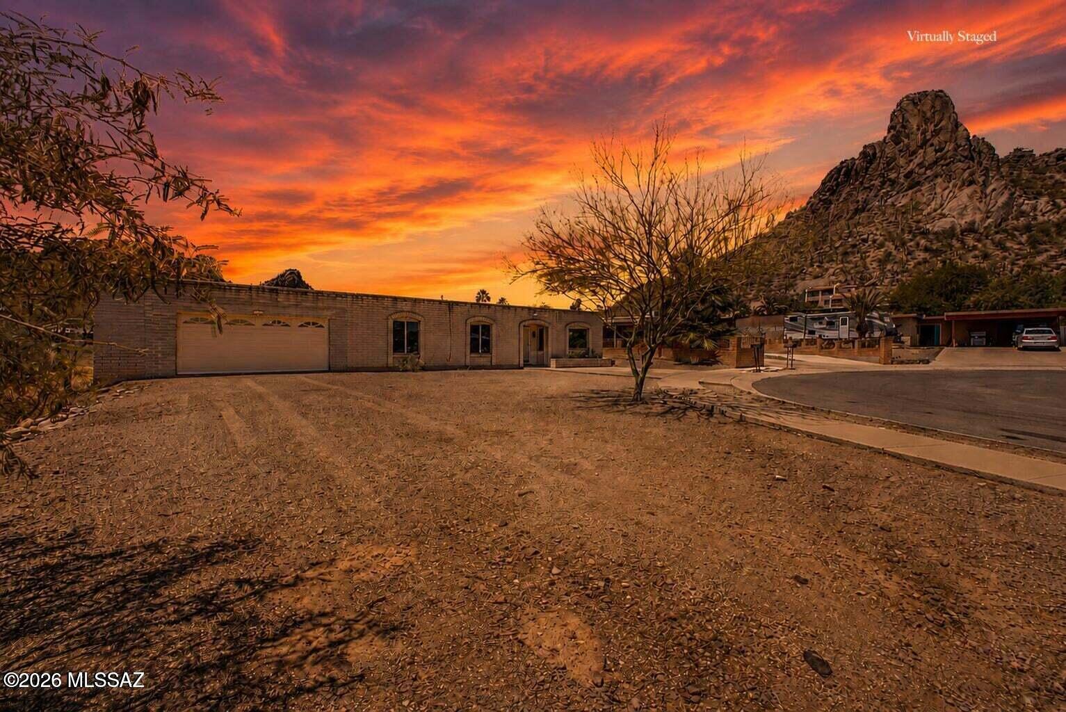 Welcome to this charming cul-de-sac home with beautiful mountain views in the desirable Manzanita Terrace neighborhood! Inside, you'll find spacious living areas filled with natural light, offering plenty of room for entertaining, storage, and comfortable everyday living. The home features wood-look flooring, new carpet in the bedrooms, and fresh interior paint. The kitchen offers ample cabinetry, spacious counters, and built-in appliances for everyday convenience. The serene main retreat includes its own private bathroom for added comfort. Enjoy the screened-in back patio, perfect for relaxing evenings, or enjoying your morning coffee while taking in the views. The large 2-car garage also opens up to the patio, providing privacy, functionality, and plenty of room for your toys, plus a large Tuff Shed for additional storage. This gem is a must-see!