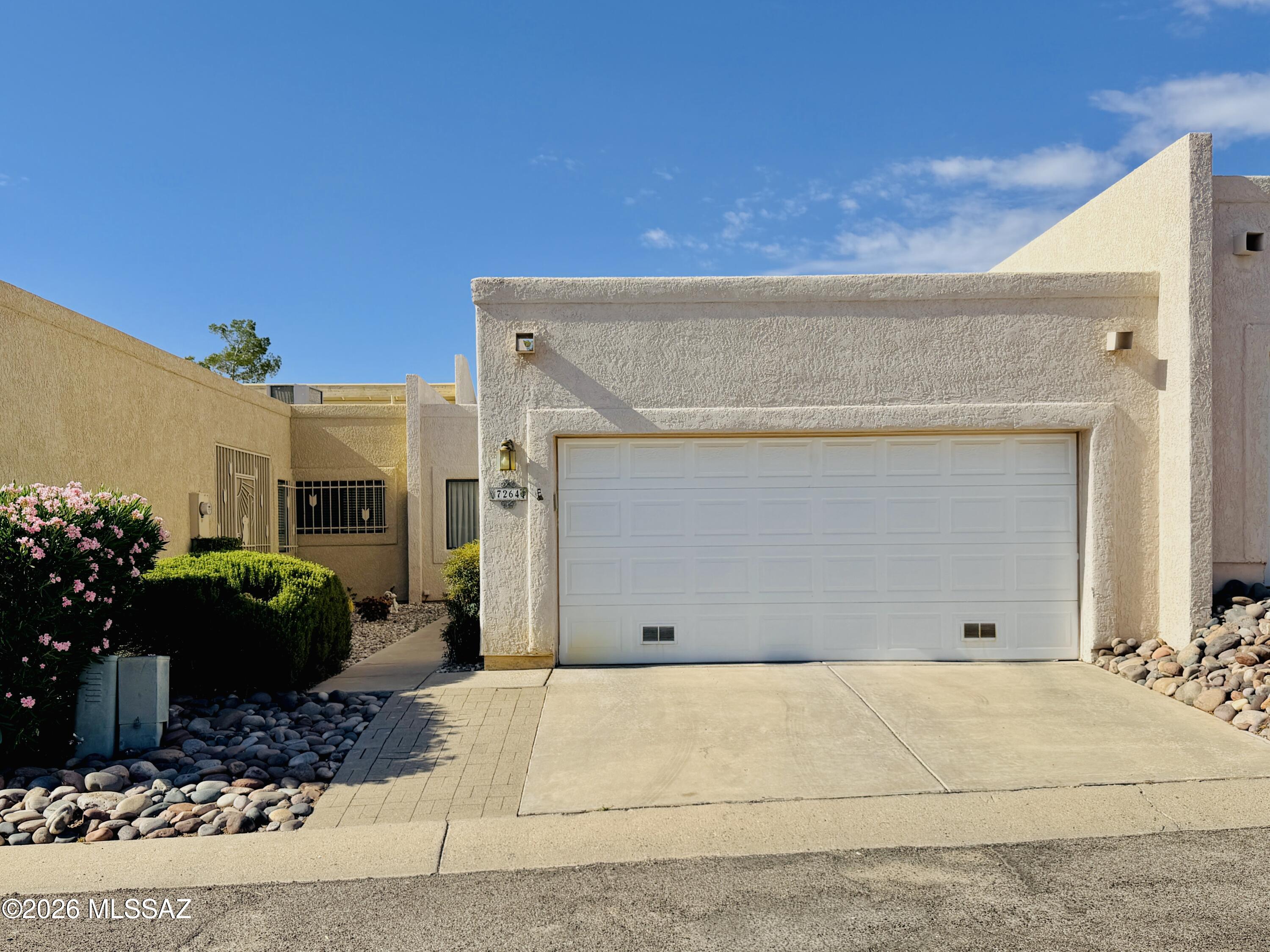 *See Video Tour in Photos Section* Great Eastside location for this large 3 Bedroom 2 Bath Townhouse in Small Montego Townhome community.  Community pool/spa within walking distance!  Open concept floor plan has lots of natural light in all rooms. Brand new vinyl plank floors, clerestory windows in living room, Dining area between living room and kitchen with breakfast bar. Master suite has a walk in closet and master bath has dual sinks. Private back patio/yard has water feature and is fully paved. Refrigerator, washer/dryer, dishwasher, Central A/C & Heat, Wrought Iron Foyer, 2 Car Garage.