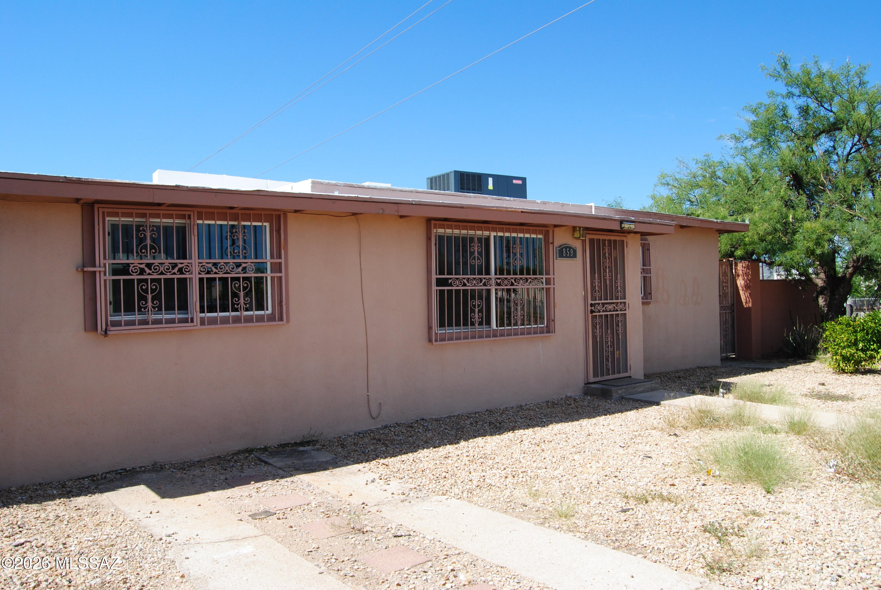 This house has a lot of space to park in the back with access from the side road. Huge back yard with BBQ. The hose has a lot storage and Big cover patio. It is located a couple blocks from the Freeway, and 10 minutes for Tucson Mall and all the stores.
