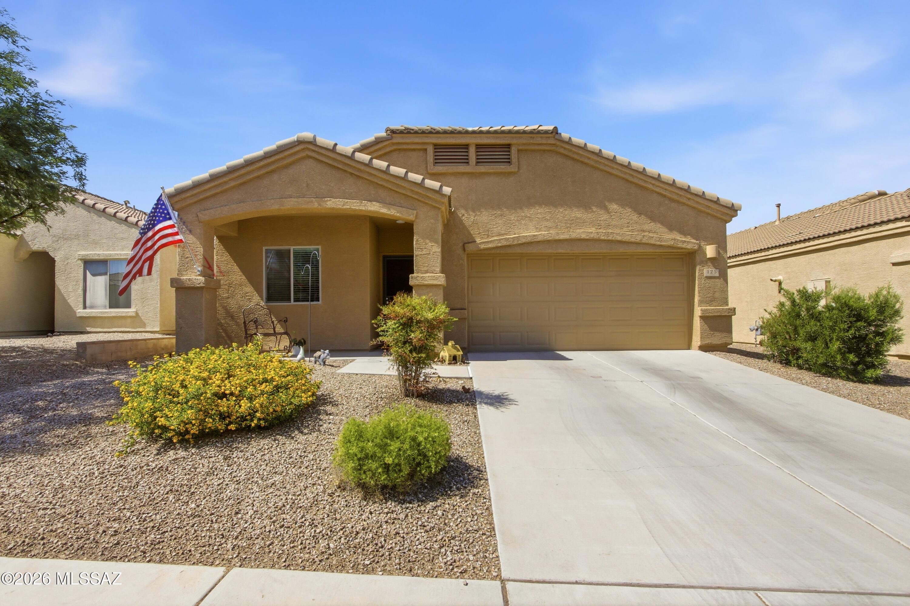 *** NO GVR LOW HOA***  Beautifully maintained 2017 home offering 3 bedrooms, 2 bathrooms, and 1,637 sq ft of thoughtfully designed living space. The open-concept floor plan features tile flooring throughout the main living areas with cozy carpet in the bedrooms and den. The kitchen is equipped with stainless steel appliances, a gas cooktop and oven, tripe reverse osmosis and elegant quartz countertops that continue throughout the home. The spacious primary suite includes a dual vanity walk in shower and ample storage. Enjoy outdoor living in the fully walled backyard with 6-foot privacy walls and professionally installed Hunter drip irrigation in both the front and back yards. A perfect blend of comfort, style, and functionality.