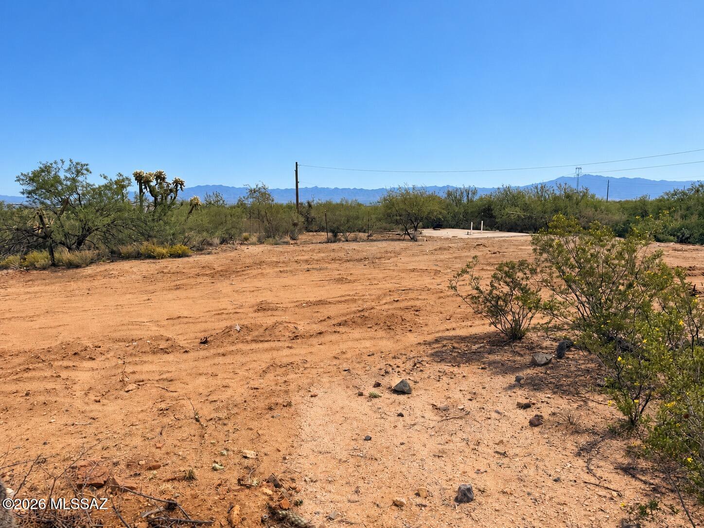 Build your dream home or desert retreat on this 2.82 acre lot in Curly Horn Ranches with sweeping desert and mountain views. RH zoning allows site-built or manufactured homes, horses, and RVs. Peaceful rural setting just off Hemet Peak Rd, minutes from Sahuarita.

This property is ready for a new home. It features a corner lot, easy access to Sahuarita and South Tucson, electric and septic utilities on the lot. Water is delivered using a subscription service.