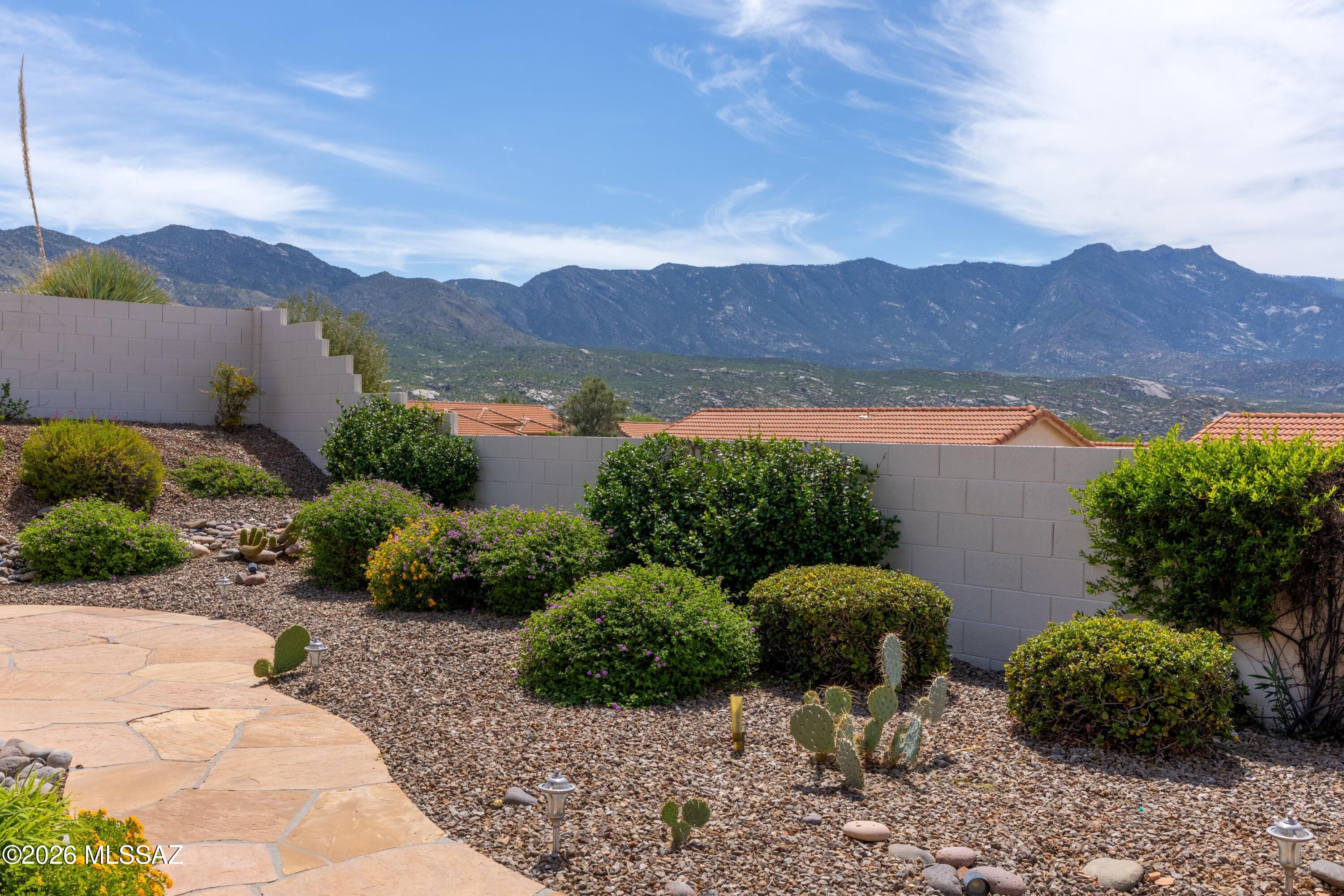 Gorgeous mountain views highlight this well-maintained Topaz model featuring 2 bedrooms, 2 baths, a versatile den, and 2,278 sq. ft. of comfortable living space. The open, light-filled floor plan is ideal for everyday living and entertaining, with beautiful mountain vistas from the main living areas and outdoor spaces. Recent updates offer peace of mind, including NEW HVAC & water heater (2025), newer kitchen appliances, NEW roof underlayment (2026), exterior paint (2026), and NEW window screens (2026). The den is perfect for an office, hobby or guest space. Extended garage. Enjoy the exceptional amenities and active lifestyle of SaddleBrooke. Fountain conveys AS-IS.