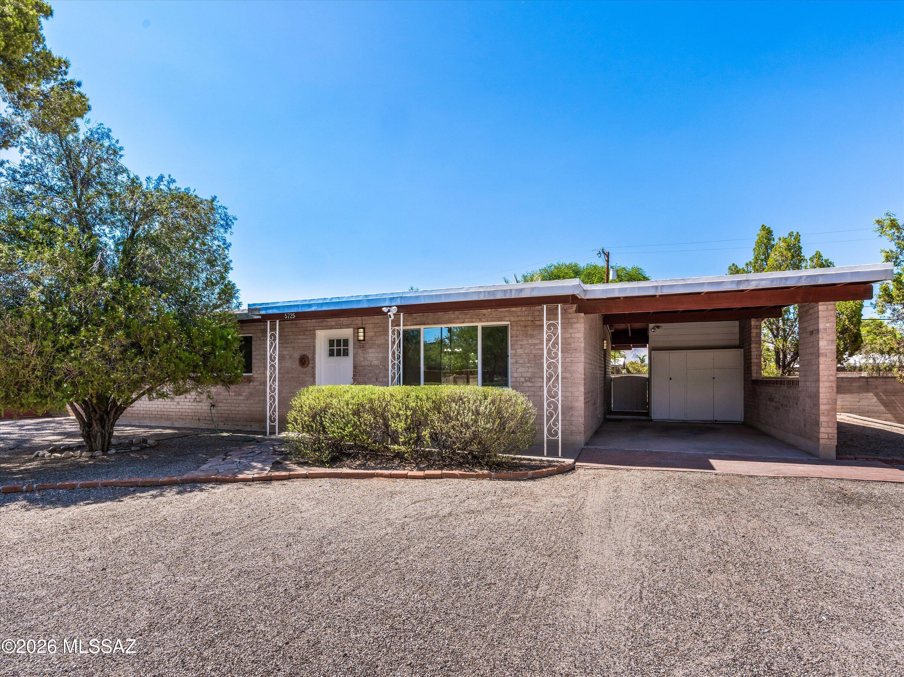 Charming 3/2 ranch-style home in the heart of Central Tucson. This light and bright home has tons of natural light and has been updated with wood laminate flooring throughout, no carpeting, freshly painted, all new dual pane windows, newer HVAC, updated kitchen with granite countertops, stainless steel appliances, and new cabinets. Formal dining area with large living room. Both bathrooms have been updated with new vanities, granite countertops, and tiled showers. A separate laundry room includes washing machine and dryer and utility sink. Easy to maintain desert landscaping in the front and back with a covered patio and mountain views in the backyard. One car carport in addition to plenty of additional parking and outdoor storage. Pets considered with landlord approval. This is a non-smoking home. Minutes from dining/shopping, and conveniently located close to the University of Arizona and both medical facilities, and a short drive to downtown Tucson for dining, music, arts, and entertainment. Owner/Agent.

If pets are allowed and approved, there is a $150 non-refundable pet fee, per pet. Renter responsible for utilities.
The application process includes credit, criminal, previous rental history, employment, and income verification. 

Pets require landlord approval. If pets are allowed and approved, there is a $150 non-refundable pet fee, per pet. Non-smoking home. Renter is responsible for all utilities. Minimum 1-year lease, security deposit due upon executed lease agreement.
