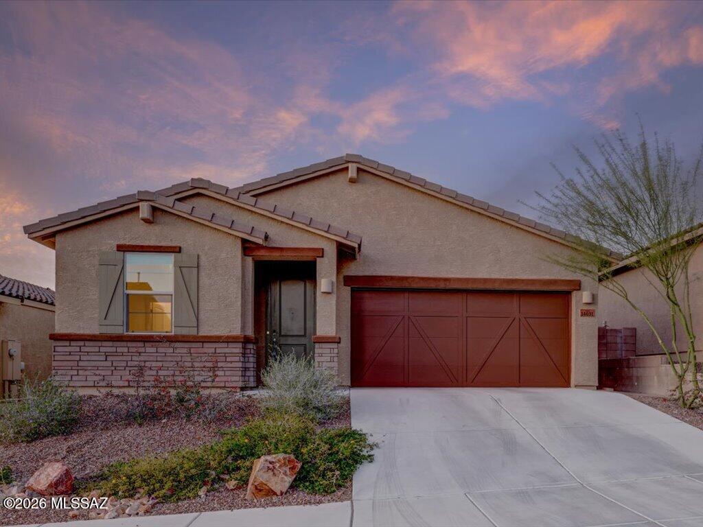 Assumable VA loan at 4.5%. This 4 bedroom 3 bath home sits on a premium lot within the Rancho Del Lago community. This amazing home features a spacious primary suite AND has an additional ensuite bedroom, perfect for guests or extended family. There are 2 additional bedrooms and a bonus area as well. The spacious kitchen has granite countertops, stainless steel appliances, and has a breakfast bar. Step outside to your private backyard, with no neighbors behind you, complete with pavers and artificial turf for easy care. Relax by the firepit with friends and family. Or head off to the golf course or go shopping all just minutes away. There are lots of community events in the neighborhood plus you are in the Vail School district. This is the one!