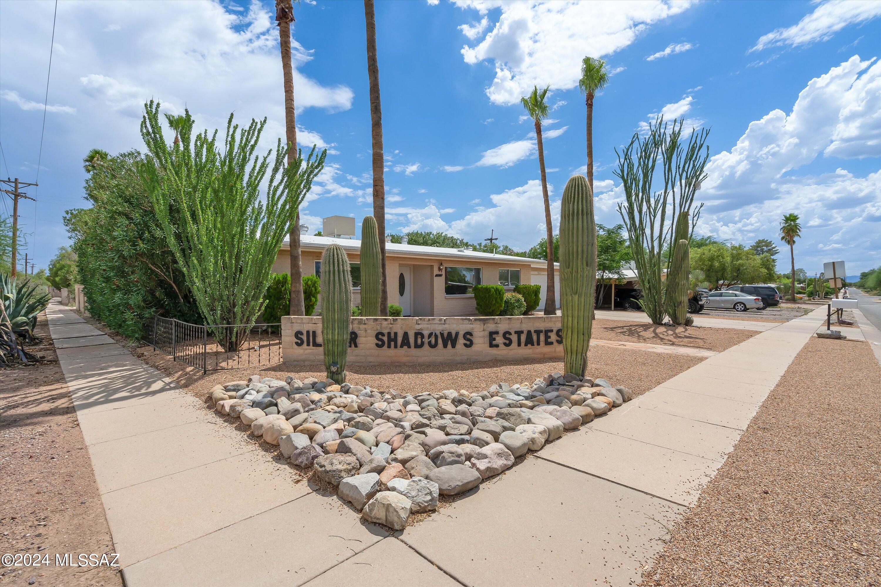 *Seller Financing Available* Modern luxury meets mid-century charm in this beautifully updated Eastside gem, located in Tucson's desirable Northeast Pio Decimo neighborhood. Situated on a generous corner lot, this remodeled 3-bedroom, 2-bathroom home offers 1,916 square feet of thoughtfully designed living space in a solid 1969 block home.
The updated gourmet kitchen is a showstopper, featuring a large center island, granite countertops, stainless steel appliances, and modern finishes that are perfect for entertaining or everyday living. Recently remodeled bathrooms, including a stunning primary bath, pair seamlessly with updated flooring, windows, and numerous upgrades throughout, creating a fresh, move-in-ready feel. A cozy gas fireplace anchors the dining area, adding warmth and character to the heart of the home. Natural light floods the space, while expansive windows frame the inviting large corner lot backyard with low-maintenance landscaping, a covered patio, and space to relax or entertain. Car enthusiasts, hobbyists, and adventurers will love the 4-car garages, including a workshop, offering endless possibilities for bikes, cars, tools, or an RV. No HOA means freedom to truly enjoy your space. Ideally located within walking distance to Udall Park, dining, shopping, and outdoor recreation, this home combines modern upgrades, flexible space, and an unbeatable Eastside location.
Updated, upgraded, and lovingly maintained, this home is must-see.