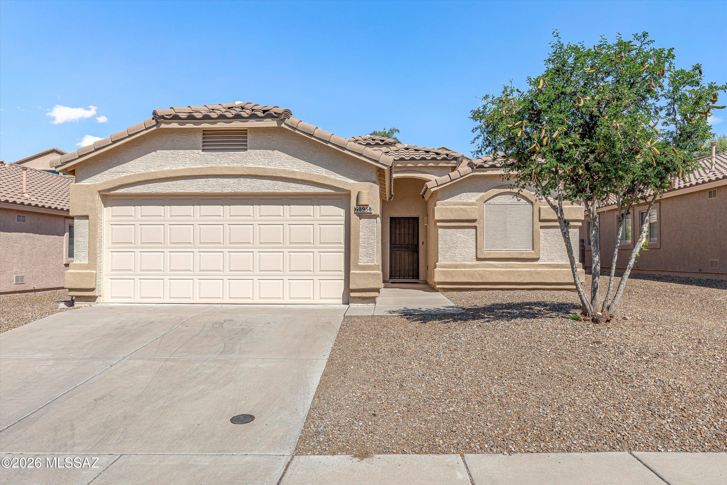 Immaculately maintained, new paint, and truly move-in ready, this beautiful 3-bedroom, 2-bath home features an open and bright split floor plan with vaulted ceilings, abundant natural light, upgraded fixtures, ceiling fans, and decorative niches throughout. The spacious great room and formal dining area provide the perfect setting for entertaining family and friends.The large kitchen offers ample cabinetry, wraparound countertops, a convenient pantry, and black appliances, including a newer dishwasher, microwave, and range hood. The oversized primary suite includes a cozy sitting area and a generous walk-in closet. The primary bath features an extended vanity with abundant counter space and a spacious walk-in shower. Situated on a  private lot near the end of a cul-de-sac,