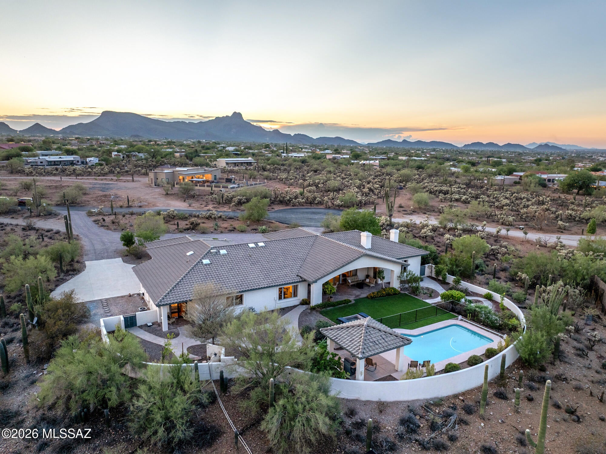 This one's a showstopper. Executive retreat on 3.37 acres with sweeping city, mountain, and desert views that never get old.
The wood-beamed Great Room is the heart of the home, with dramatic windows that pull the panorama right in - everyday living & effortless entertaining under one gorgeous roofline. The chef-inspired kitchen delivers with a double oven, breakfast bar, breakfast nook, and a huge walk-in pantry, while the formal dining room sets the stage for gatherings big and small.
The split floor plan means generous bedrooms and total privacy for everyone. The primary suite is a true retreat: cozy fireplace, spa-inspired bath with separate vanities, a walk-in shower and soaker tub, an enormous walk-in closet, and private backyard access.Step outside to a sparkling pool, a large gazebo, easy-care turf, and lush plantings - all framed by those million-dollar views. And there's room for everything else, too: an extra-depth 3-car garage with a workshop and ample storage, plus space for the RV.
This extraordinary home is ready for its next chapter. Come see it for yourself!