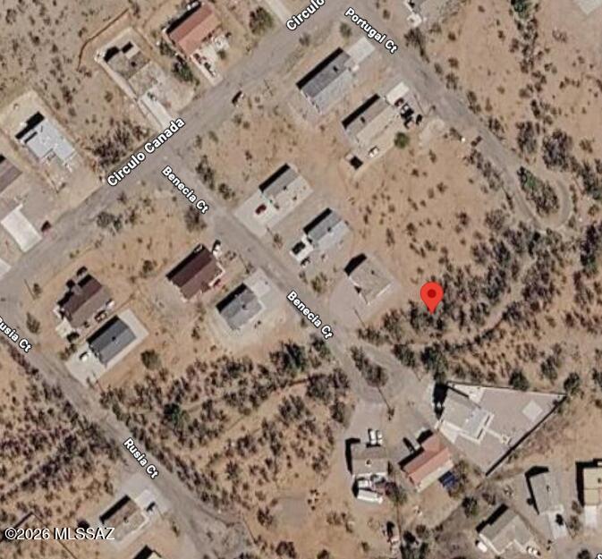 Discover the perfect opportunity to build your dream  home on this desirable cul-de-sac lot in Rio Rico. Located in a quiet, peaceful community surrounded by established homes, this property offers the ideal setting for those looking to enjoy a relaxed small-town atmosphere. With many homes already built in the surrounding area, you'.. have the comfort of an established neighborhood while still having the opportunity to design and build a home that fits your lifestyle. The cul-de-sac location provides a quieter setting with less through traffic and a welcoming residential feel. Enjoy the tranquility of a country-town community, this Rio Rico lot is worth a look. Bring your plans and make this property the foundation for your future home!