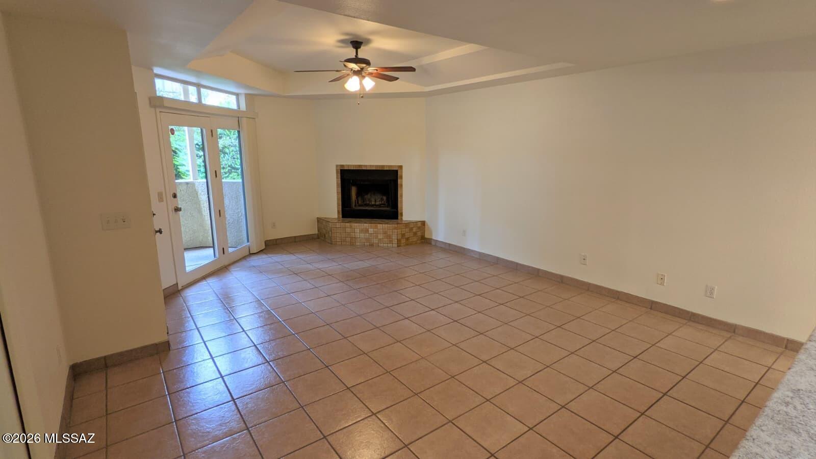Don't miss your opportunity to own this wonderful downstairs condo in the desirable 1200 River community! This 2 bedroom, 1 bath condo boasts ceramic tile throughout. Wood burning fireplace, walk-in closets, ceiling fans in both bedrooms and living area. Enjoy 2 patios, one located just off of master bedroom the other off of living room. Extra storage space located off of back patio. Conveniently located minutes from St. Philip's Plaza, La Encantada, Tucson Mall, the Rillito River Walk, and the University of Arizona