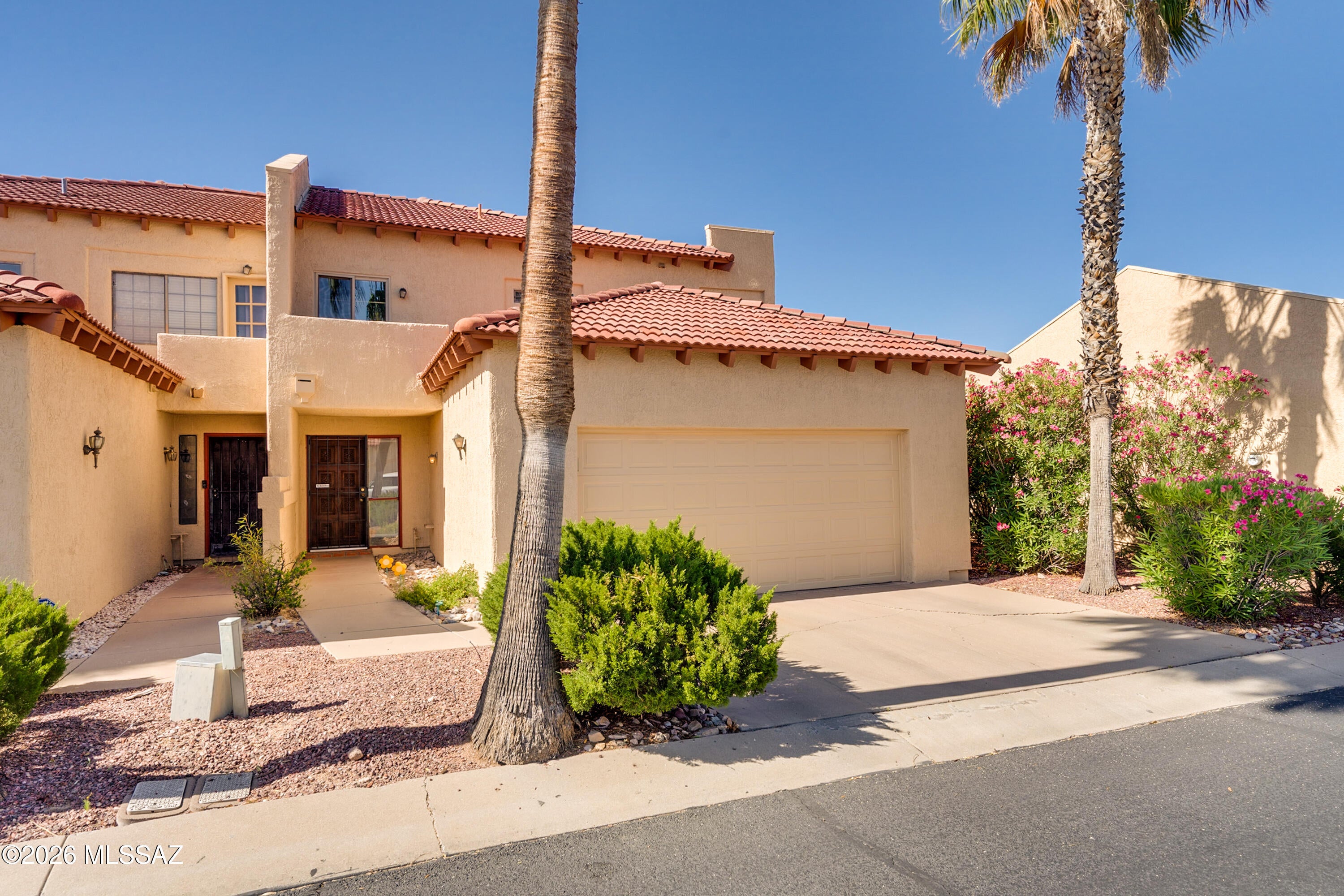 Mountain Views | End Unit | Pool & Spa | 2-Car Garage

Wake up to beautiful Catalina Mountain views from this spacious 3BR/2.5BA end-unit townhome offering nearly 2,000 sq. ft. Features include generous living and dining areas, fireplace, updated kitchen with stainless appliances, center island and ample cabinetry. Enjoy a private patio with mountain views and Arizona sunsets. Upstairs are spacious bedrooms, remodeled baths with oversized soaking tubs, plus full-size washer/dryer. Community amenities include pool, spa and pickleball courts. Minutes to TMC, shopping, dining, The Loop, hiking and biking. Attached 2-car garage. Tenant pays electric & water. No pets.