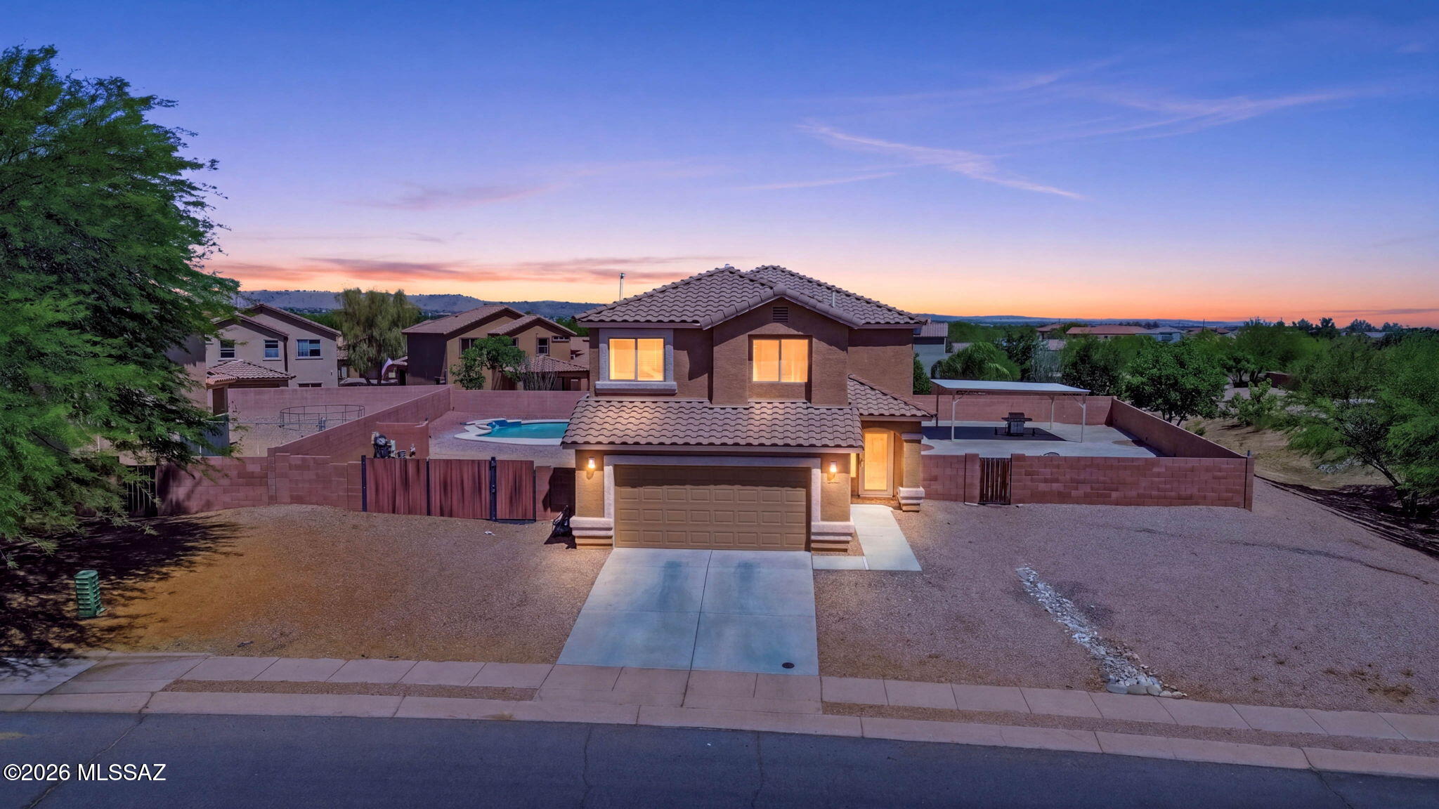 Seller will accept and/or counter offers between $399,997 & $411,997. Freshly painted inside & out, this 4-bedroom, 2.5-bath home features fully owned solar, an EV charger, & a 2-car garage. All four bedrooms are conveniently located upstairs, creating a functional layout w/ ample living & entertaining space on the main level, along w/ a convenient downstairs powder room for guests. Situated on a .34-acre lot-one of the largest in the neighborhood-the backyard is built for entertaining w/ a sparkling pool, covered Ramada, spacious yard, & double gate access. Community amenities include a pool, walking paths, parks, playgrounds, & sports courts. Conveniently located in Sahuarita near I-19, shopping, dining, schools, & everyday conveniences. Move-in ready and ready for Summer Fun!