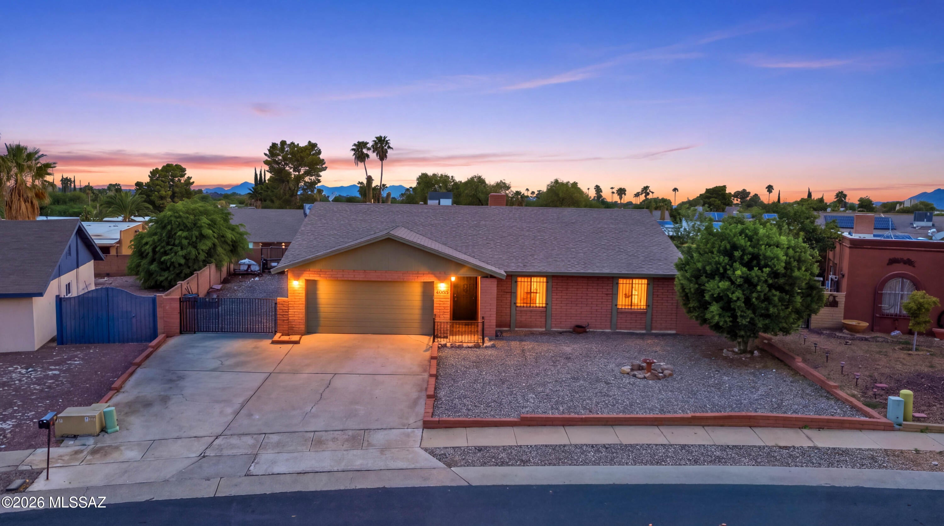 Welcome to this spacious 3-bedroom, 2-bath home in Tucson's established Rolling Hills neighborhood! Offering approximately 1,672 sq. ft. of single-level living, this classic ranch-style home features a functional floor plan, inviting living spaces, and a kitchen with breakfast bar. Enjoy a generous backyard with covered patio, low-maintenance landscaping, and block walls--perfect for relaxing or entertaining. An attached 2-car garage adds convenience and storage. Ideally located near Rolling Hills Park, golf, shopping, dining, and everyday amenities on Tucson's east side.