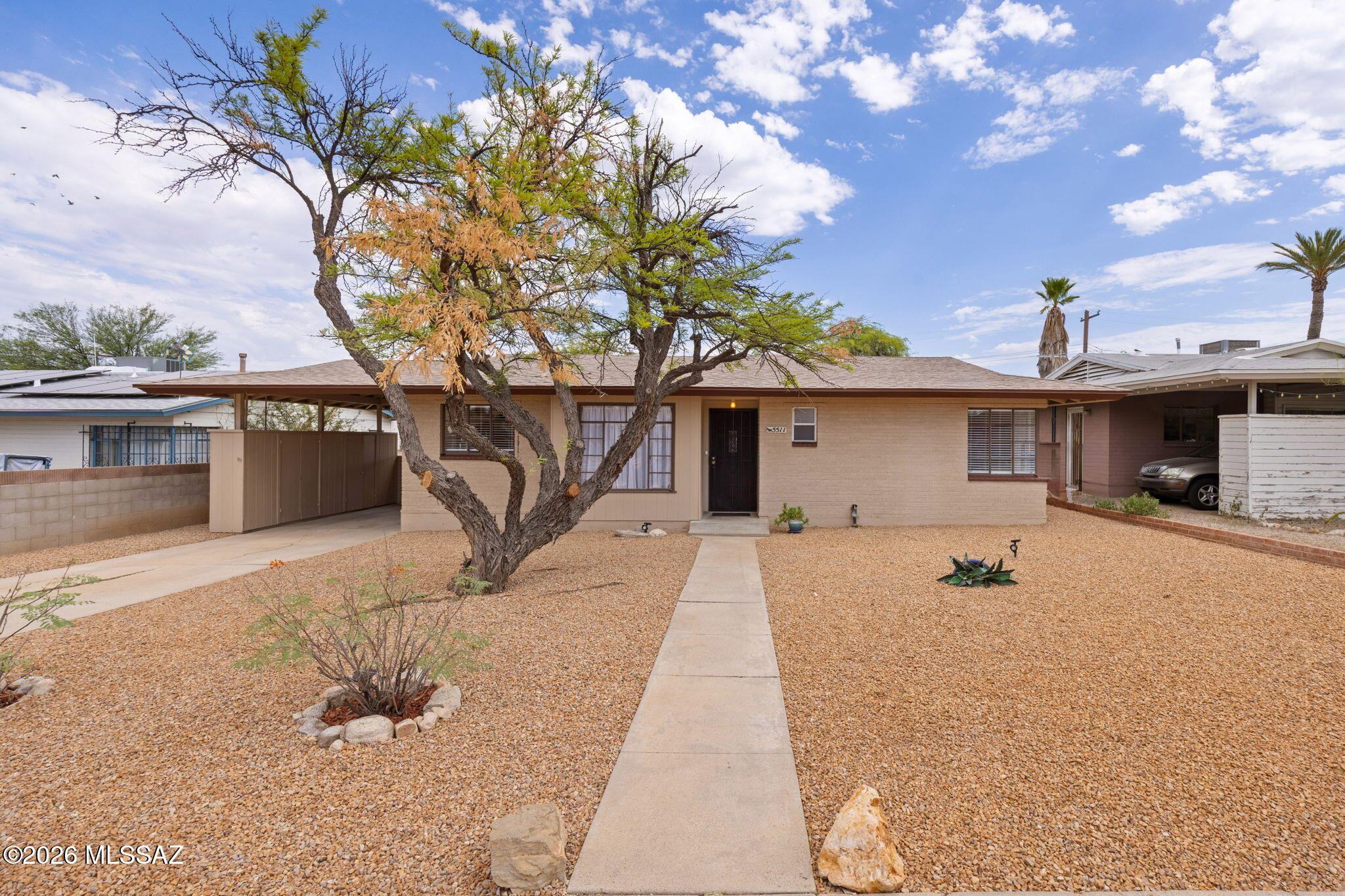 This 1953 home reflects the optimism and practicality of the post war era--simple, spacious, and designed for suburban living, with charming mid-century details, the seller has tried to preserve. Whether you prefer to move in and enjoy it as-is or gradually modernize to reflect your style and needs, the opportunities are substantial. A large lot that offers a blank canvas for outdoor living, gardening or development/expansion under the Zoning R-1. The cozy interior features, 2 bedrooms, open living area, practical kitchen, 1 bathroom with an additional multi-purpose room that leads out into the back yard. The large ceramic floor tiles create a flowing floor plan. The yard has been divided into two sections, another blank canvas. Seller has recently painted the interior and exterior, added decorative gravel to front yard. This Home is MOVE in READY!