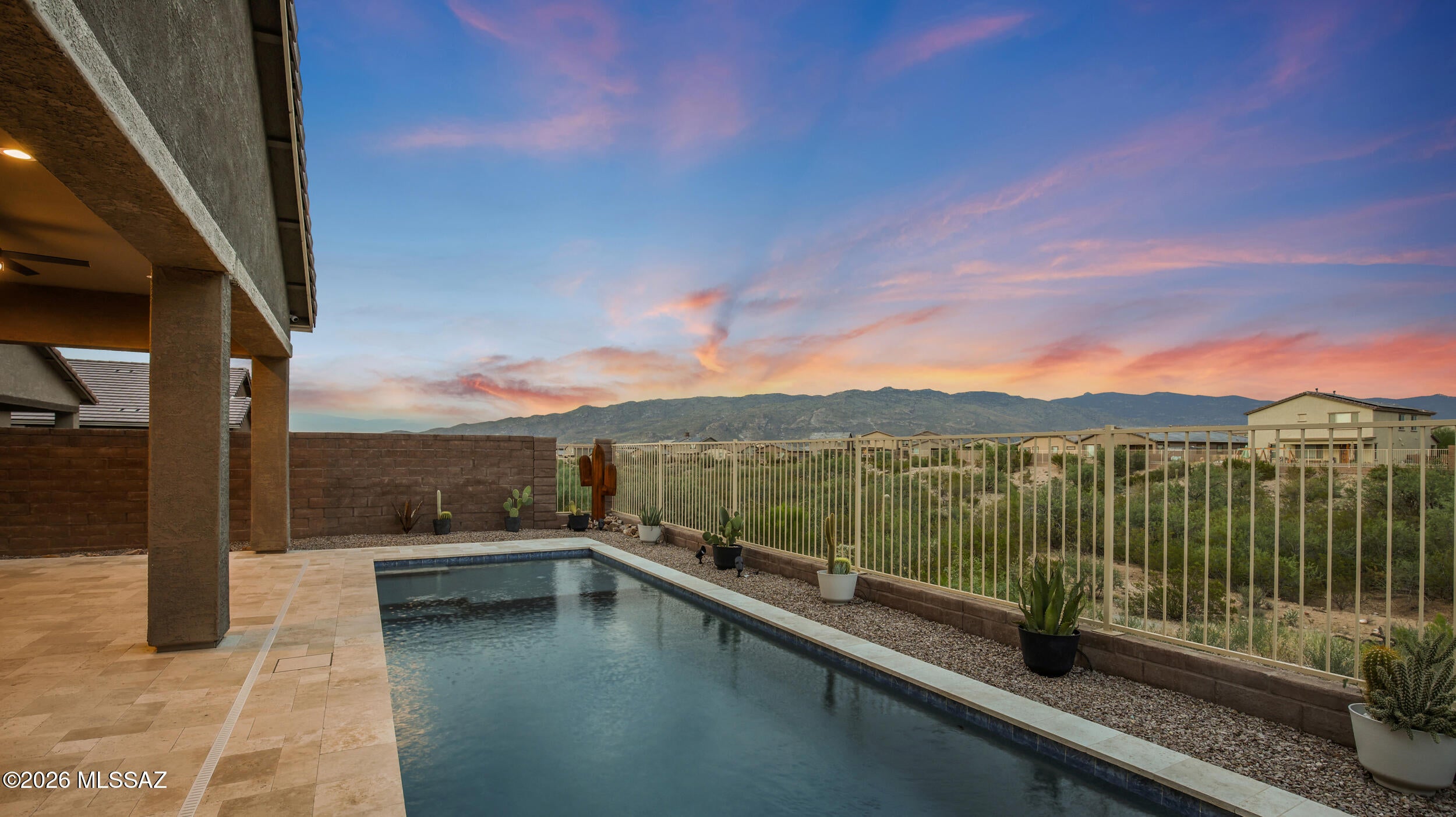Welcome to this beautiful, well-maintained 3 bedroom plus a den, 2.5 bathroom home located in the desirable Rocking K neighborhood. With no rear neighbors and a beautiful view of the mountains, the backyard is the perfect place to enjoy quality time in the heated, saltwater pool. The sliding doors to the backyard make the already open kitchen and living room feel even more spacious. The 2 car garage is insulated, features a workshop and has the equipment to add an EV charger. On top of all these other features the home also has a separate single car garage and an office. Located in the highly sought-after Vail Unified School District and conveniently close to Davis-Monthan AFB, Raytheon, shopping, dining, and more!