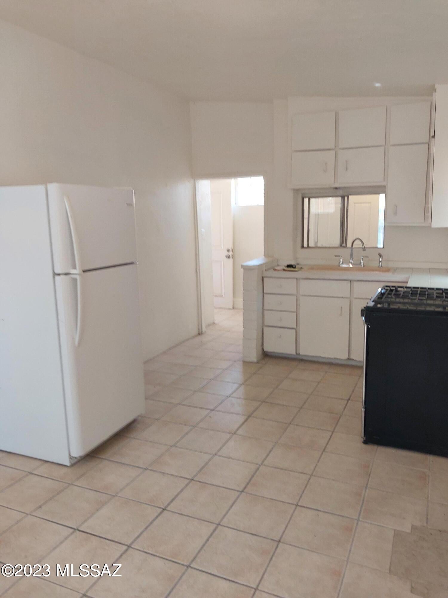 This unit is the back unit of a 2-plex.
This is a one bedroom one bath home with a gas range and a refrigerator in kitchen. There is a laundry room with washer/dryer hookups. Call for a showing.
