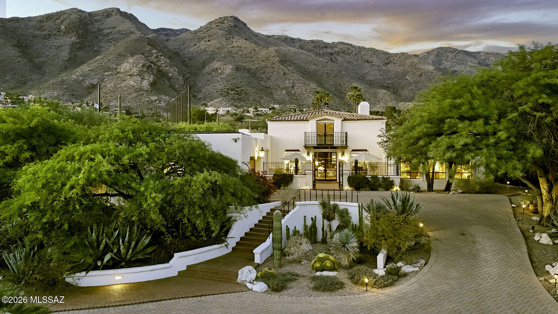 Timeless Elegance & Beauty captured in this one-of-a-kind Spanish Colonial Masterpiece, remodeled & updated in the highest quality, craftsmanship and design.  Rich Architectural Features include Cathedral Ceilings, Wall-to-Wall Brick Floors, Hand-carved Doors, Scalloped Arches, Floor-to-Ceiling Windows, 4 Masonry Fireplaces, Wrought Iron Fixtures, Mezzanine Library w/Balcony.  Deep Setback, Majestic Front Elevation, Gated Driveway & Courtyard w/ Multiple Patios and Meandering Walkways through Pristine Desert Landscape.  1st Class Kitchen Remodel by ''Affinity Kitchen'' includes Wolf Gas Cooktop, Convection & Steam Ovens, SubZero Refrigerator and Paykel Fisher DW.  It's  Gourmet & Gorgeous!  Open Floor Plan Scaled for Entertaining w/ Separate Bedroom Wings and 3 Beautiful Bathrooms. A home worthy of "Architectural Digest" sited on over an Acre, with Unobstructed Catalina Mountain Views.  Lovingly Maintained, Loaded with Upgrades, including Solar.  You'll love living in Guard Gated Skyline Country Club, where you'll experience some of the most spectacular scenery of any Golf Course Community in the entire southwest.  Close to Everything yet Away from it All!  An Opulent Opportunity to own an Architectural Jewel, Reminiscent of our Cherished Tucson Legacy, the "Arizona Inn."