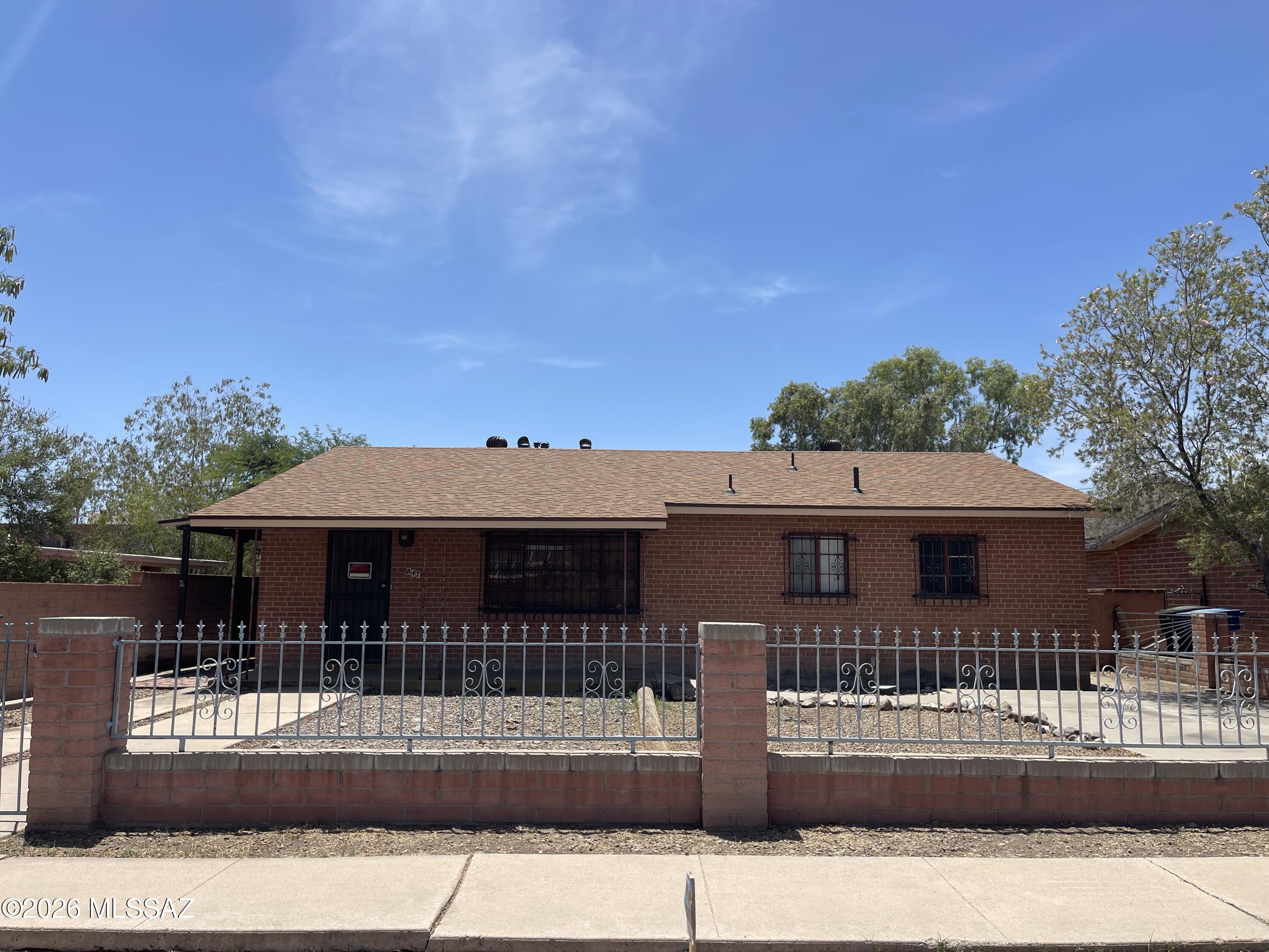 Located in the heart of Tucson's historic Menlo Park Neighborhood, this brick home presents an incredible opportunity for investors, renovators, or buyers looking to create something truly special. Conveniently situated with easy freeway access and just minutes from downtown Tucson, the home is near the Tucson Streetcar, Mercado San Agustín, and convenient access to local dining, and entertainment. Full of character and potential, this fixer-upper offers the chance to reimagine and transform the space into your vision. Opportunity, location, and possibilities all come together in this unique property.