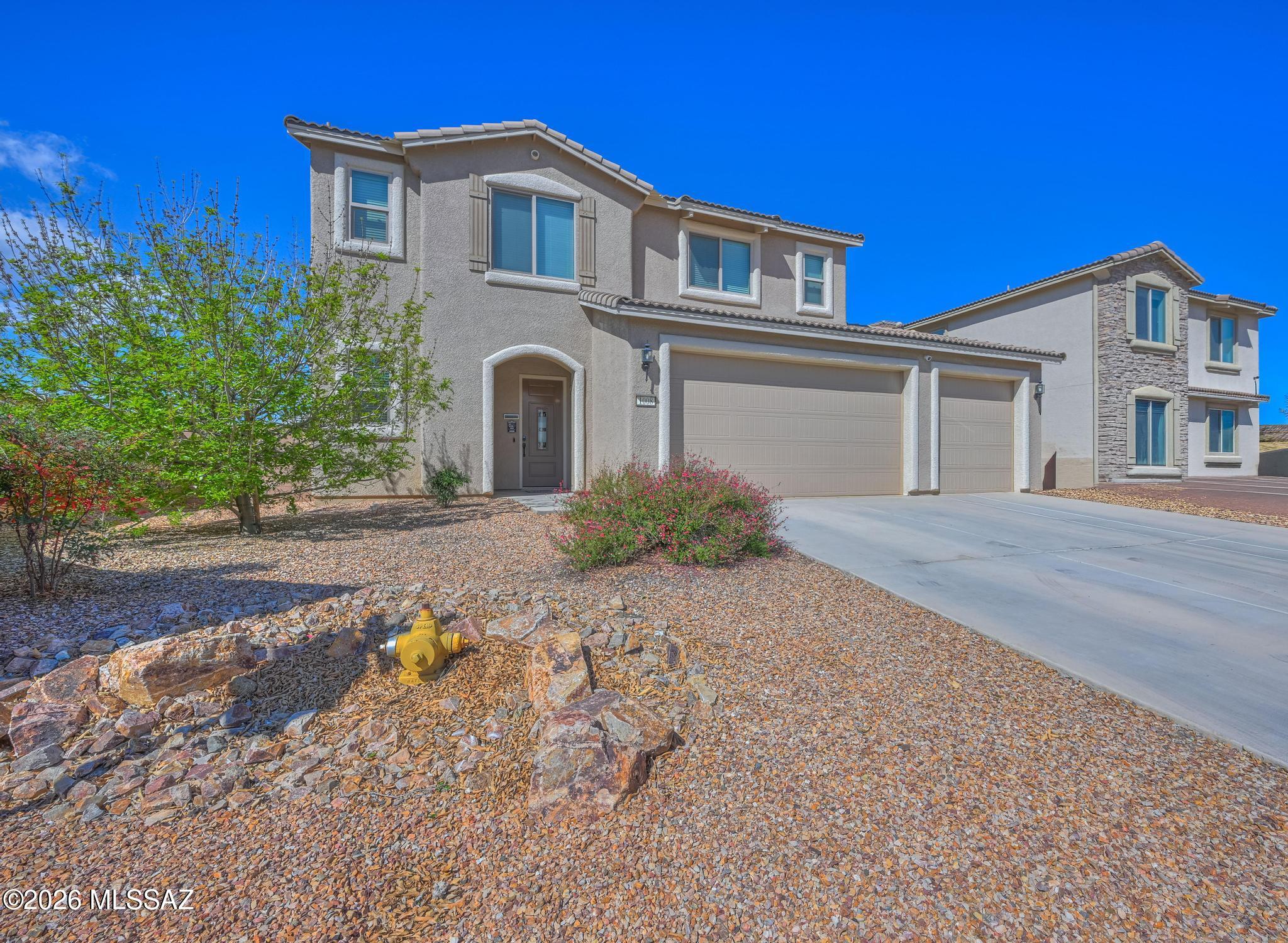 Beautiful 2-story R.L. Workman home built in 2019 offering 4BR/2.5BA and 2,401 sq. ft. of quality construction and modern style. This home features beautiful tile, plush carpet, and Energy Star Low-E windows for comfort/efficiency. The spacious primary suite includes ensuite bath w/dual granite vanity, separate tub and shower, water closet, and walk-in closet. The updated eat-in kitchen (2024) showcases gorgeous granite counters, rich wood cabinetry, stainless appliances, pantry, island, and breakfast bar. Enjoy a second living area or formal dining space plus three additional bedrooms and full bath upstairs. Includes upstairs washer/dryer, covered patio, block-fenced yard, water softener, 3-car garage, and wide driveway. Conveniently close to shopping, restaurants, Ft. Huachuca.
