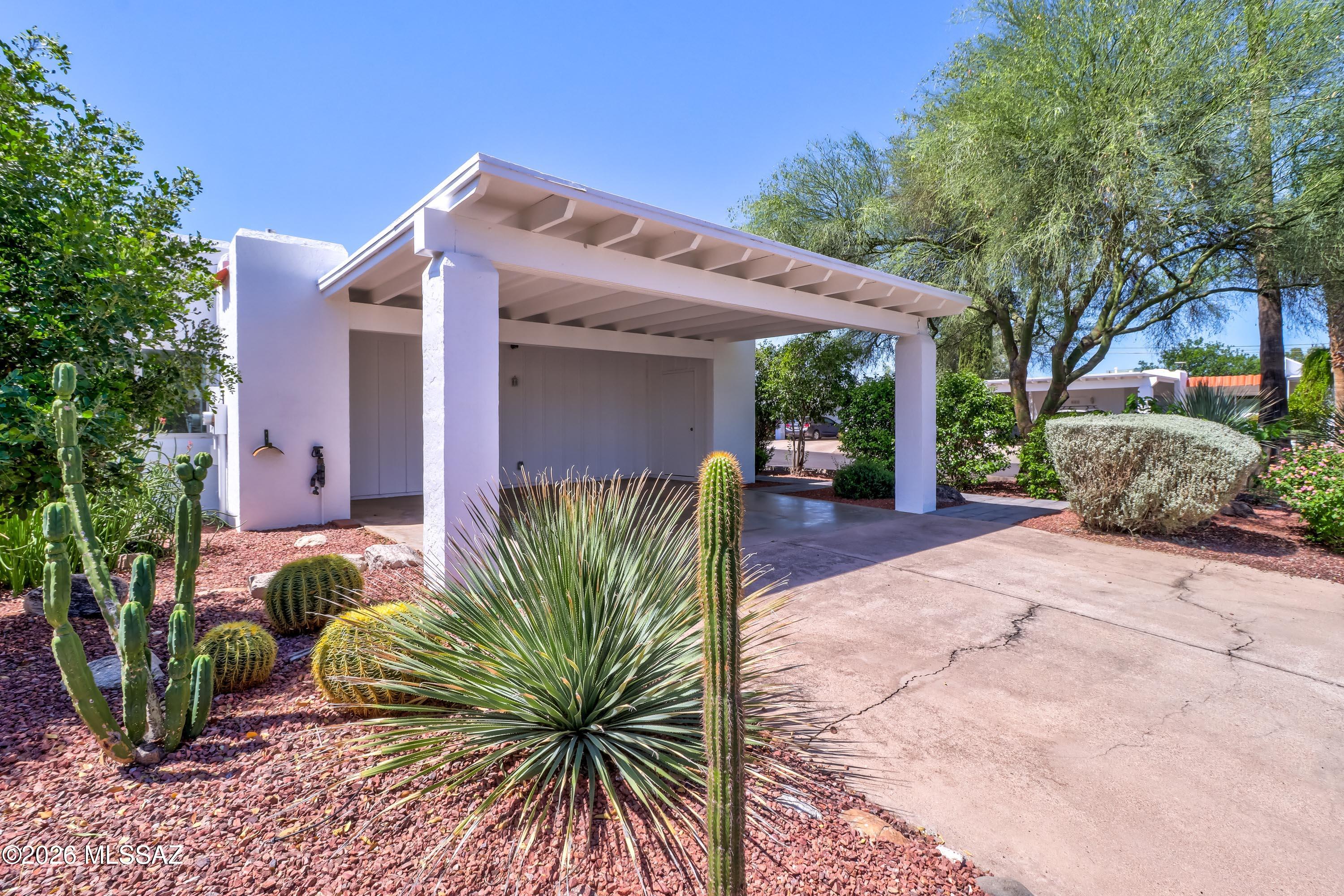 Charming 3BD/2BA townhome offering 1,440 sq. ft. with ceramic tile and fresh paint. Features include a cozy fireplace, additional storage, a large private rear patio, and welcoming front courtyard with landscaping. Community amenities include a pool, all in a centrally located community near TMC, restaurants, shopping and convenient public transit access.