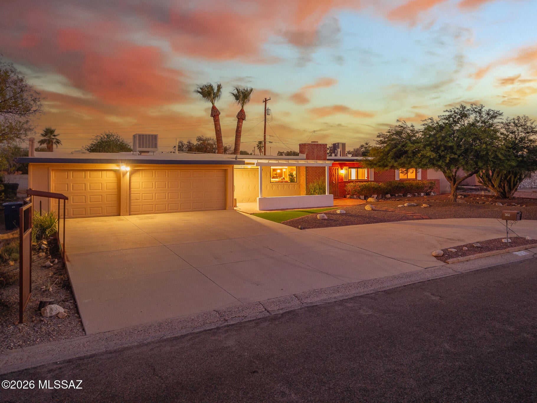 Welcome to this beautifully maintained 3-bedroom, 2-bath ranch-style home in East Tucson's desirable Green Hills neighborhood. A rare 3-car garage a, workshop space, and two storage sheds offers exceptional functionality. Step outside to your private backyard oasis featuring a sparkling gated pool, expansive patio, and spacious yard perfect for relaxing or entertaining. A circular driveway, recently recoated roof, and low-maintenance landscaping add even more value. With no HOA and true move-in-ready condition, this home offers the perfect blend of comfort, convenience, and pride of ownership.