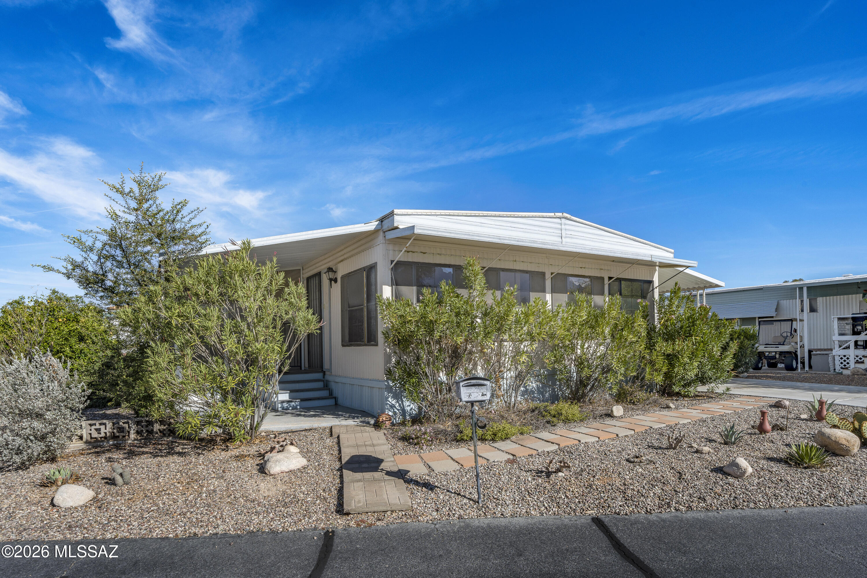 Motivated Seller. Bring all offers.Experience the best of Oro Valley living in this darling 2BD/2BA + den home located in The Highlands, a beautifully maintained 55+ community in the heart of Oro Valley w/ spectacular Catalina Mountain & Pusch Ridge views. Ready for your personal touch & TLC. Perfect as a full-time residence or winter retreat, this home offers a light-filled interior & comfortable living spaces designed for easy Arizona living. Land is owned, and storage is a breeze w/ 2 separate sheds & carports. The Highlands offers an exceptional lifestyle with a year-round heated pool, horseshoes, mini golf, bocce ball, & full calendar of social activities. The clubhouse features a stage, library, pool room, & card room, and residents can participate in outings, exercise classes, language lessons, and more.Ideally located near miles of biking and hiking trails, Lambert Park, the Oro Valley Community Center, & all major conveniences, this home combines comfort, community, & breathtaking views.Come enjoy the vibrant, active lifestyle that makes The Highlands such a special place to call home!