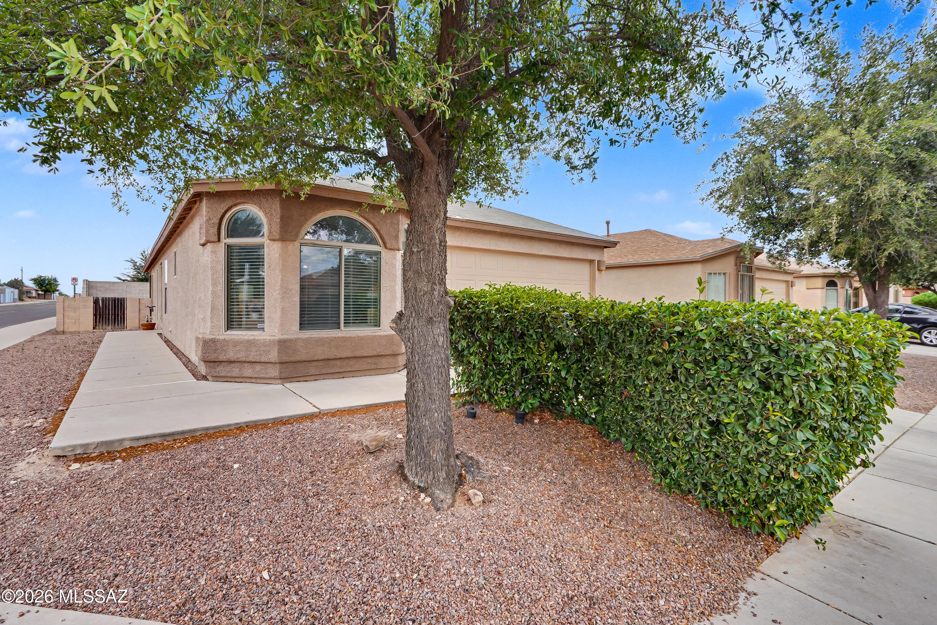 Quaint home in a convenient Tucson location! This inviting property features a spacious and thoughtfully designed floor plan with a large great room, 3 bedrooms plus a den/office area, and 2 full bathrooms. This home offers comfortable living and an open kitchen complete with an island and dining area. Find a generously sized yard and a garage. This is a rare find in its price range and won't last long. Come see it before it's gone.