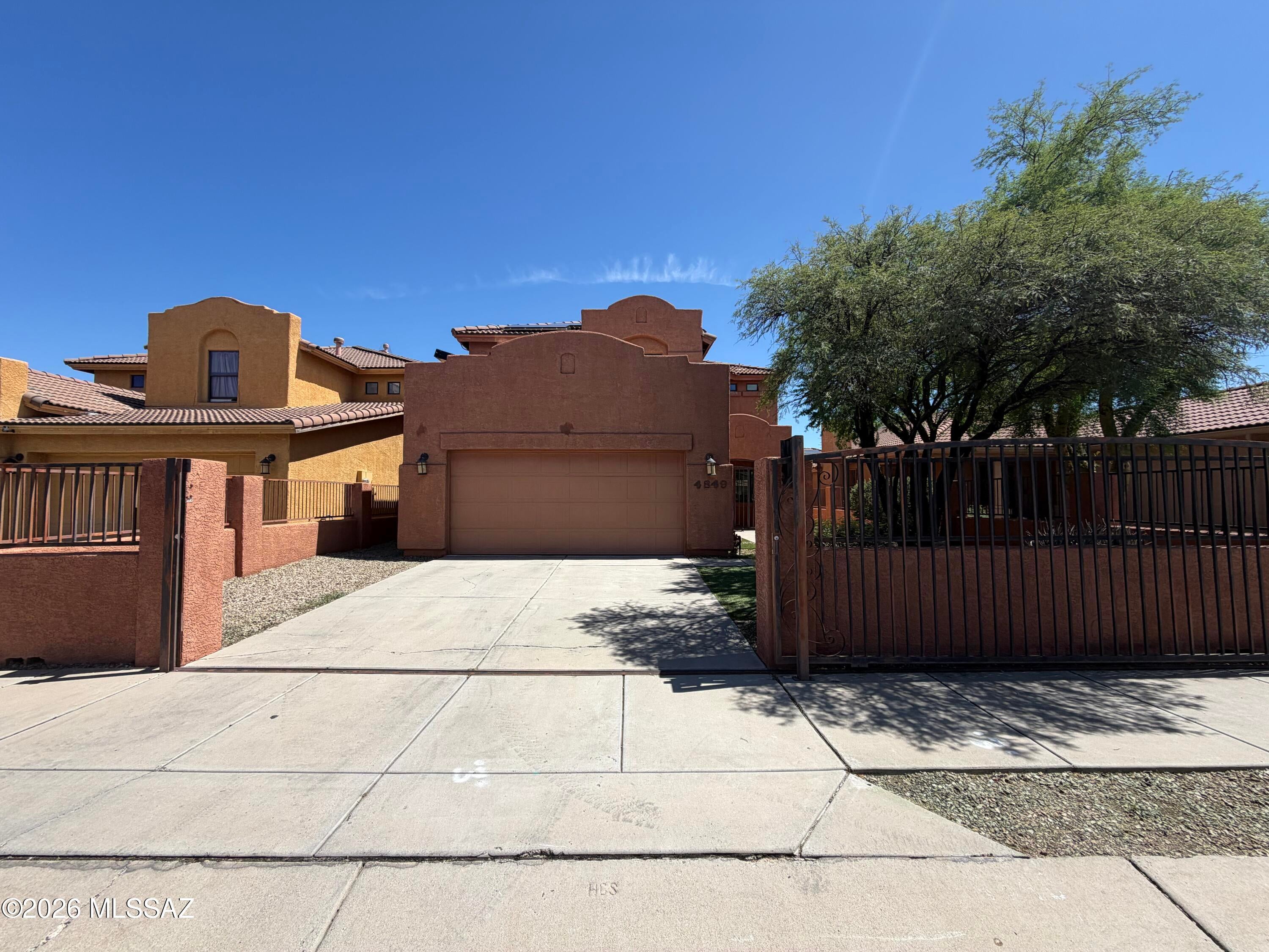 INCREDIBLE BUYER INCENTIVES: $5,000 MORTGAGE CONCESSION. Seller will pay up to $5,000 at closing towards your interest rate buydown if you finance with lender of sellers choice.

4849 S Albacete Ave is a two-story Tucson home with four bedrooms, three bathrooms, and 2,329 square feet of living space. Built in 2006, it features a living area with a high ceiling and upper windows, plus a separate sitting area and an upstairs loft. The kitchen includes an island, wood cabinetry, stainless steel appliances, and an adjoining dining area. The primary bedroom has balcony access and an adjoining bathroom with dual sinks and a shower. A downstairs bedroom and full bathroom add flexibility. Outside, a covered patio faces the backyard, and a two-car garage provides parking. Included 100-Day Home Wa