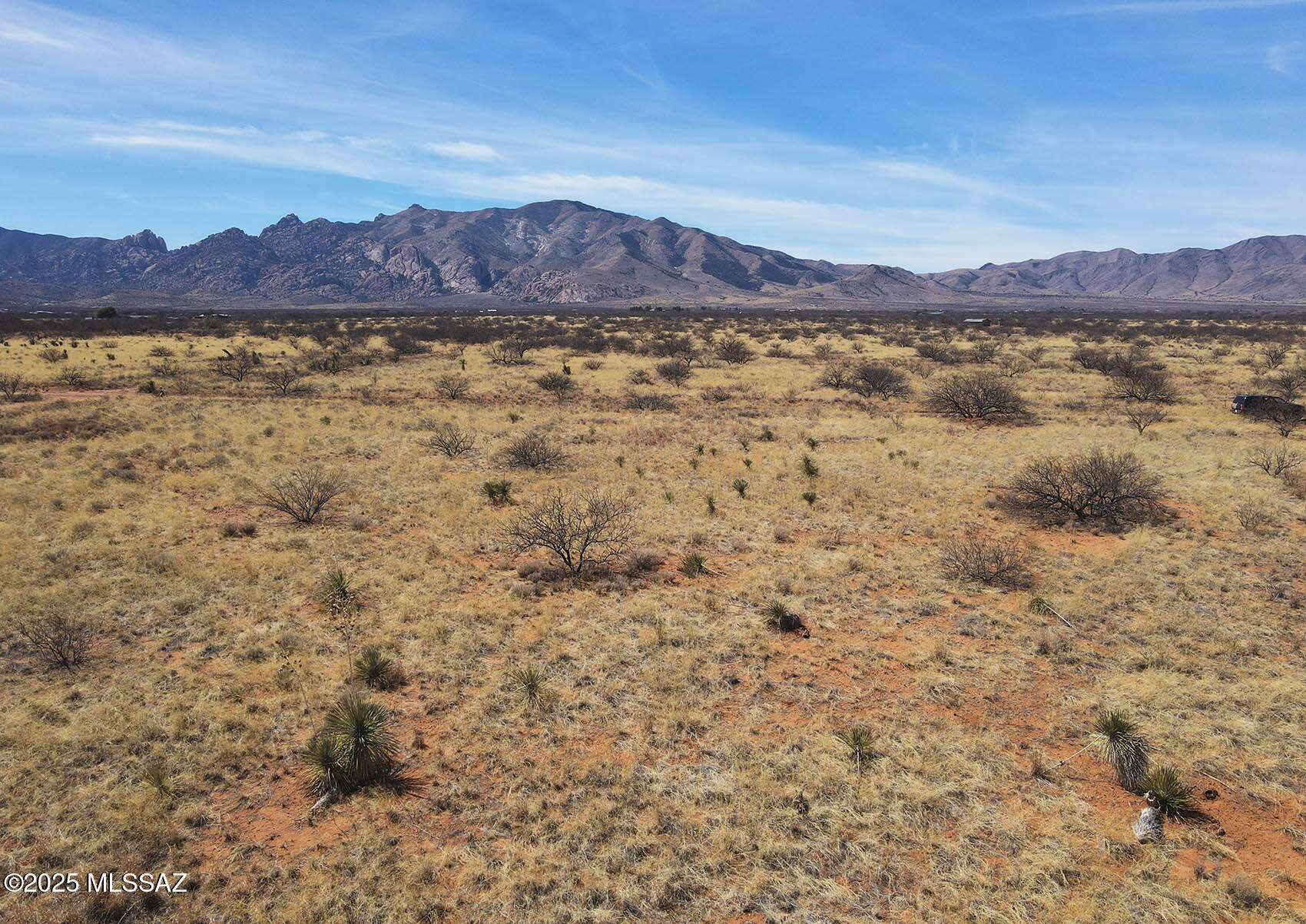 Two contiguous corner lots totaling 2.14 acres with nice easy access and impressive up-close views of Cochise Stronghold & Dragoon Mountains. Only 2/3 mile from the intersection of Cochise Stronghold & Ironwood Rds. Best access by Eastland & Skyline, well traveled & maintained. *Tipton shows as Utah St. on some maps. Only 30 minutes to Benson or Willcox and just a short drive to the town of Sunsites. Zoned SR-43, site built homes. Drill well, catch or haul water. Central Cochise County is home to all kinds or historic and natural wonders. Lots are at 4,500 feet in elevation. Escape the calamity of the city and plant your flag in the tranquility of this history-rich and incredibly beautiful high desert country. **Includes two parcels, Cochise APNs 119-07-142 & 119-07-143