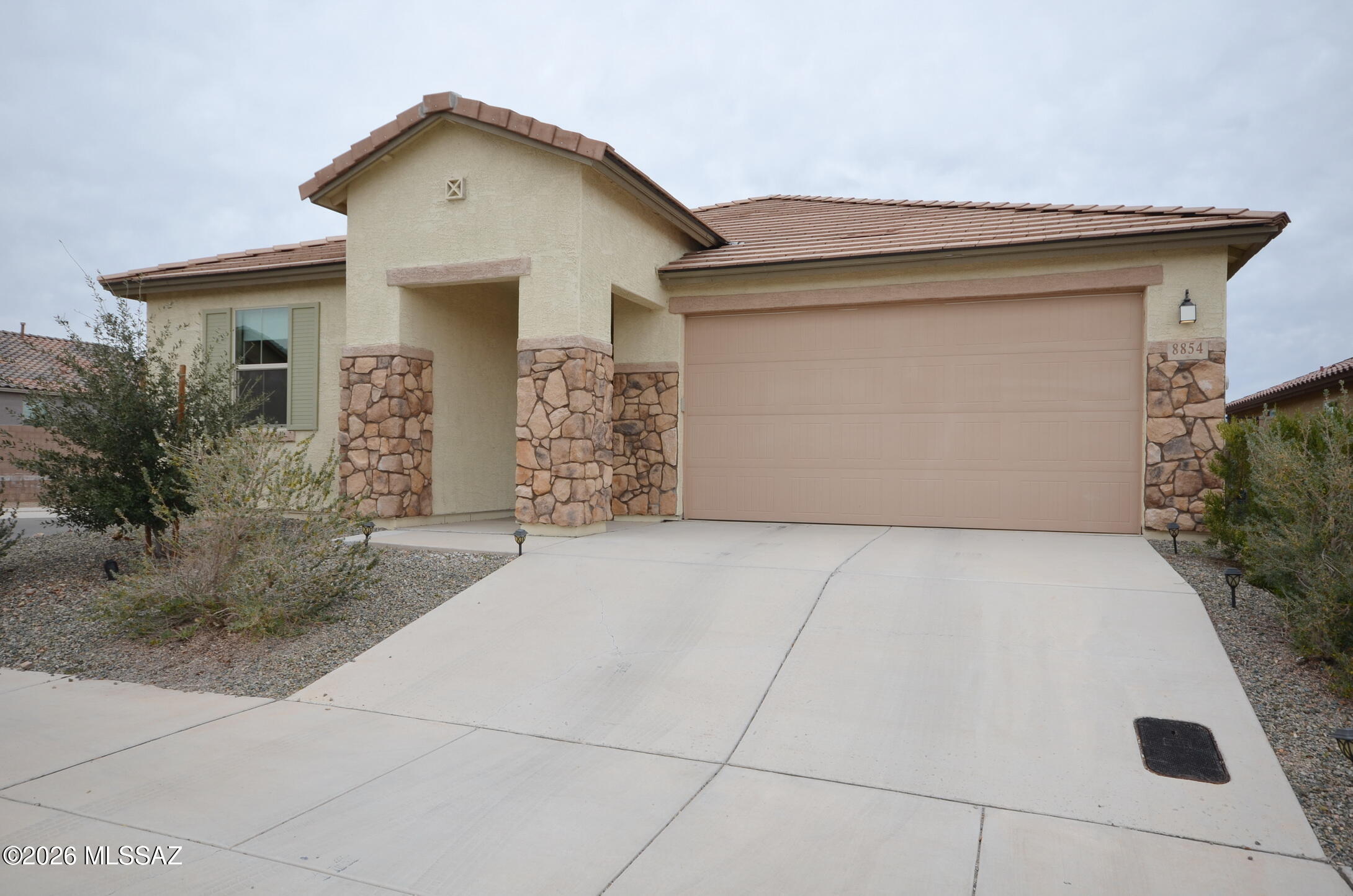 Stunning open floor plan with 4 bedrooms, 2 bathrooms, large entry living room, tile floors throughout, except bedrooms. Large and beautiful kitchen with large island, Stainless Steel appliances and butler spacious pantry.