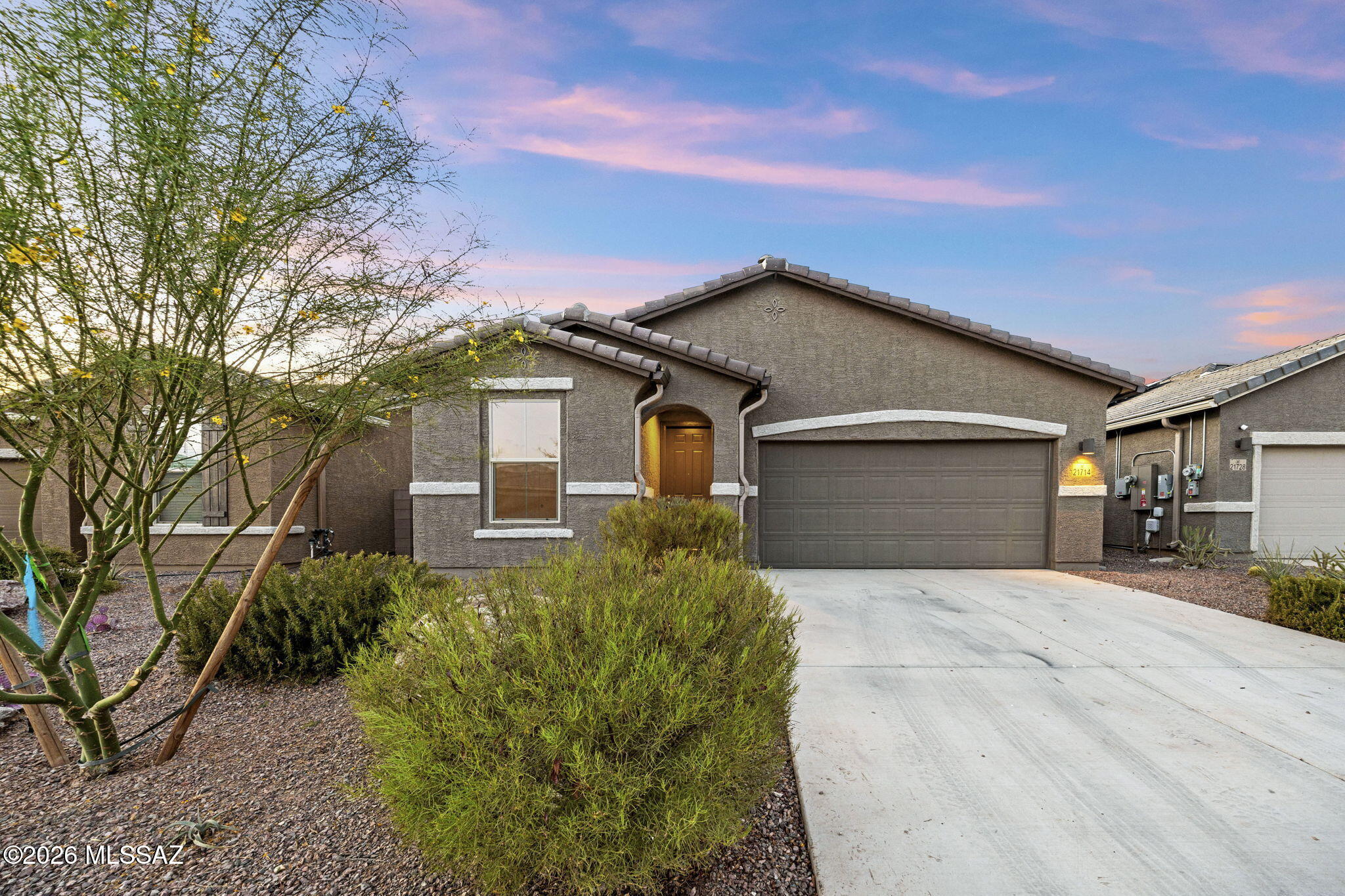 Run home and skip the builder markup to save over $30K instantly! This stylistic and clean move in ready home is far less than the current builder price for the same floor plan! This 3BD2BA open flor plan designed for modern luxurious living. The gourmet kitchen features granite countertops, white cabinets, stainless steel appliances, and a spacious island for food preparation and hosting parties. This home showcases thoughtful builder upgrades, and designer fixtures in every room. Outside, relax under the covered patio with a graded backyard ready for your dream setup, there's room for a pool, cold plunge outdoor sauna or all of the above, dream big! The community amenities are unreal for families and anyone who enjoys outdoor fun. Red Rock Village offers a pool with waterslides, skate park, playgrounds, volleyball courts, and miles of sidewalks. USDA $0 down financing available!