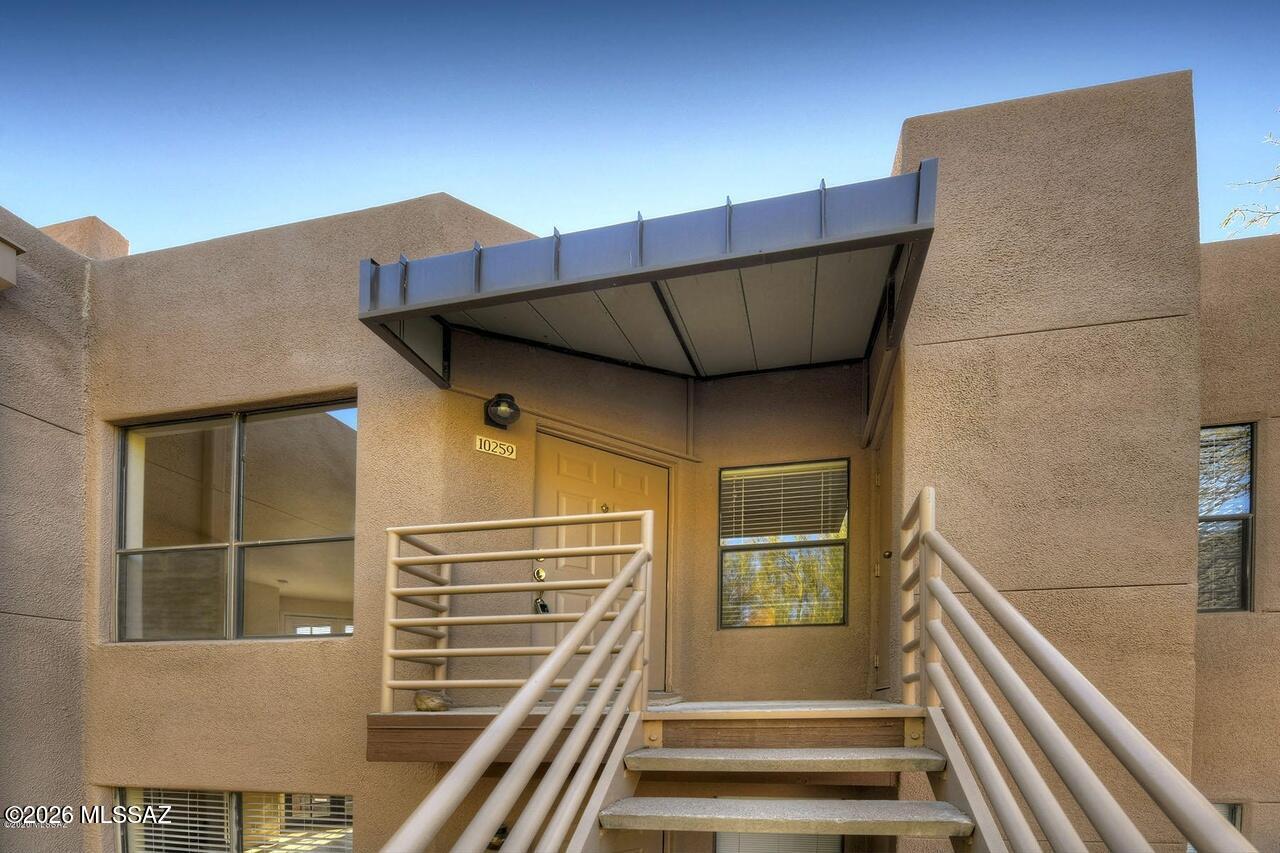 Canyon View at Ventana Condo Top Floor 2 Bedroom 2 Bath with screened in patio space. Bright and Airy dining area, kitchen with Quartz counters, stainless steel appliances, breakfast bar and closet pantry. Living room with corner fireplace and french doors that lead to screened in patio. Primary bedroom has walk in closet and two separate vanities. Split bedroom floor plan, full size washer/dryer, small storage space, covered parking. Community pool/spa, clubhouse, fitness center, tennis court and its minutes from Ventana and Sabino Canyon. This condo is offered as NON-SMOKING. Dogs are subject to owner approval. Cats will NOT be considered.