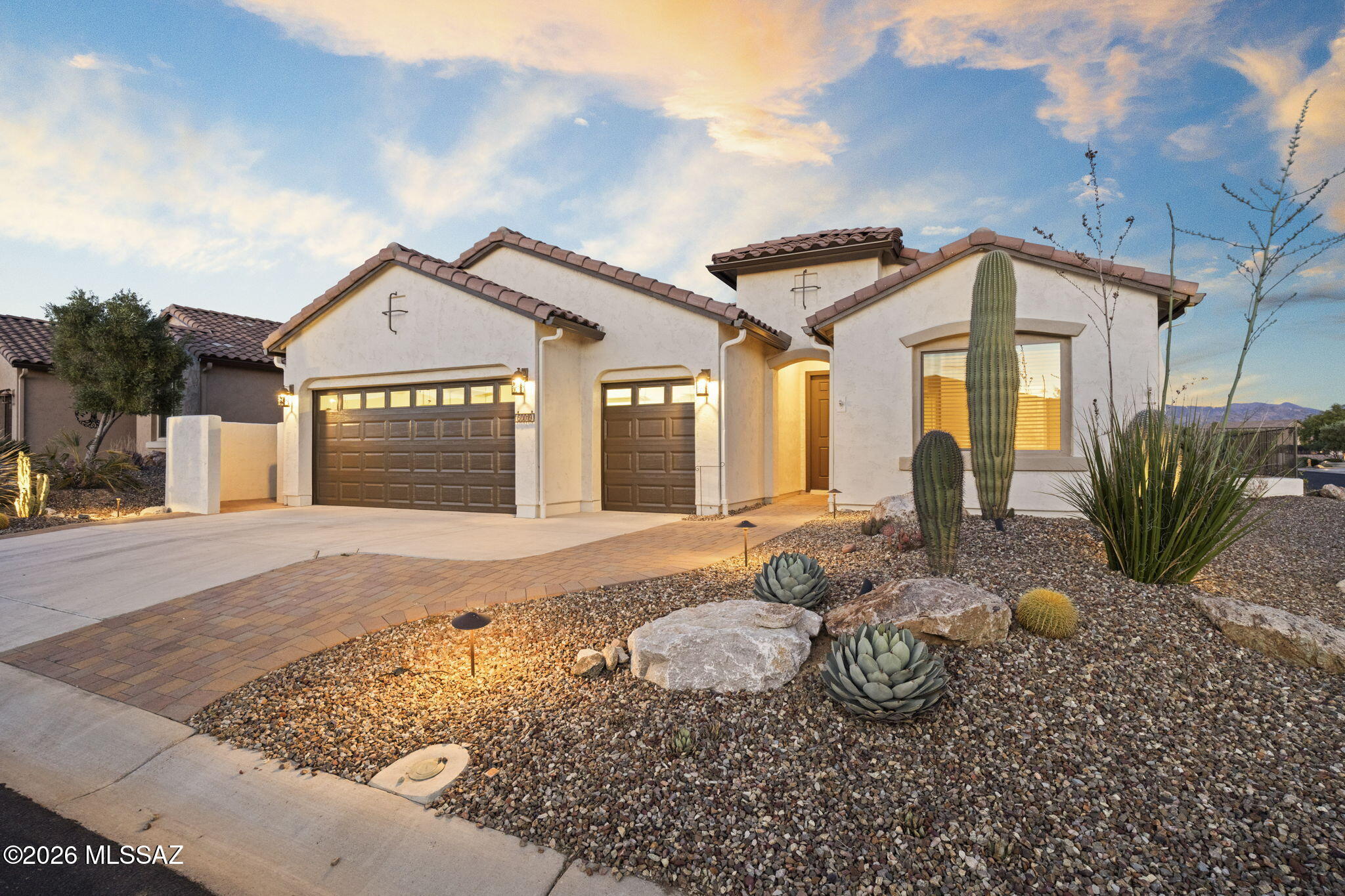 Welcome to resort-style living in SaddleBrooke Ranch, a premier 55+ active adult community. This beautifully maintained 1,809 sq ft home sits on a premium corner lot and features 2 bedrooms with ensuite baths, a versatile den, and a half bath--ideal for guests.

Enjoy upgraded finishes including crown molding, 18'' tile, plantation shutters, surround sound, new carpet, and fresh interior paint. A 2024 HVAC system and owned solar add year-round efficiency.

Relax in your private backyard with Catalina Mountain views, a gas fire pit, and easy-care desert landscaping. Recently painted exterior, plus a two-car and golf cart garage. 

Get ready to enjoy the vibrant SaddleBrooke Ranch lifestyle.