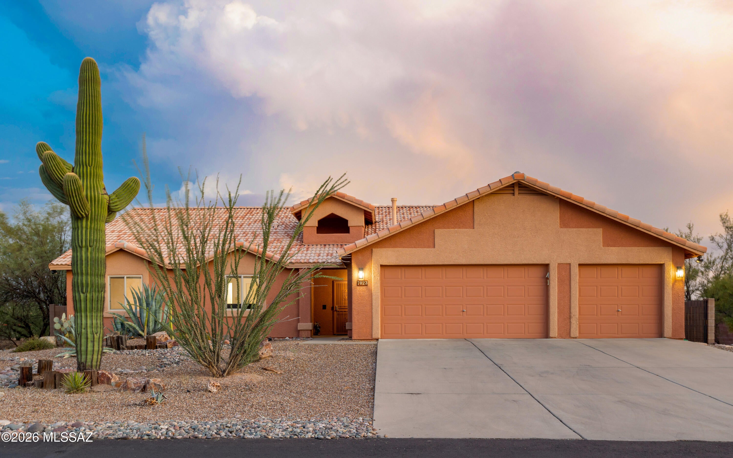 MOVE IN READY HOME with a pool and a 3 car garage, all sitting on a corner acre lot. Updated kitchen with upgraded cabinets, granite countertops, tile backsplash and newer stainless steel appliances. Vinyl plank flooring and 20 inch tile throughout home. Spacious floor plan includes a living room with electric fireplace and a family room off of the kitchen. Modern light fixtures and surround speaker system throughout home and back patio. Fresh interior paint and epoxy coated garage floor. Garage also has mini split system for air conditioning.  Backyard built for entertaining with an extended back patio leading to the swimming pool with plenty of privacy as no rear neighbor or shared wall. Rear gate for trailer or RV parking in backyard.