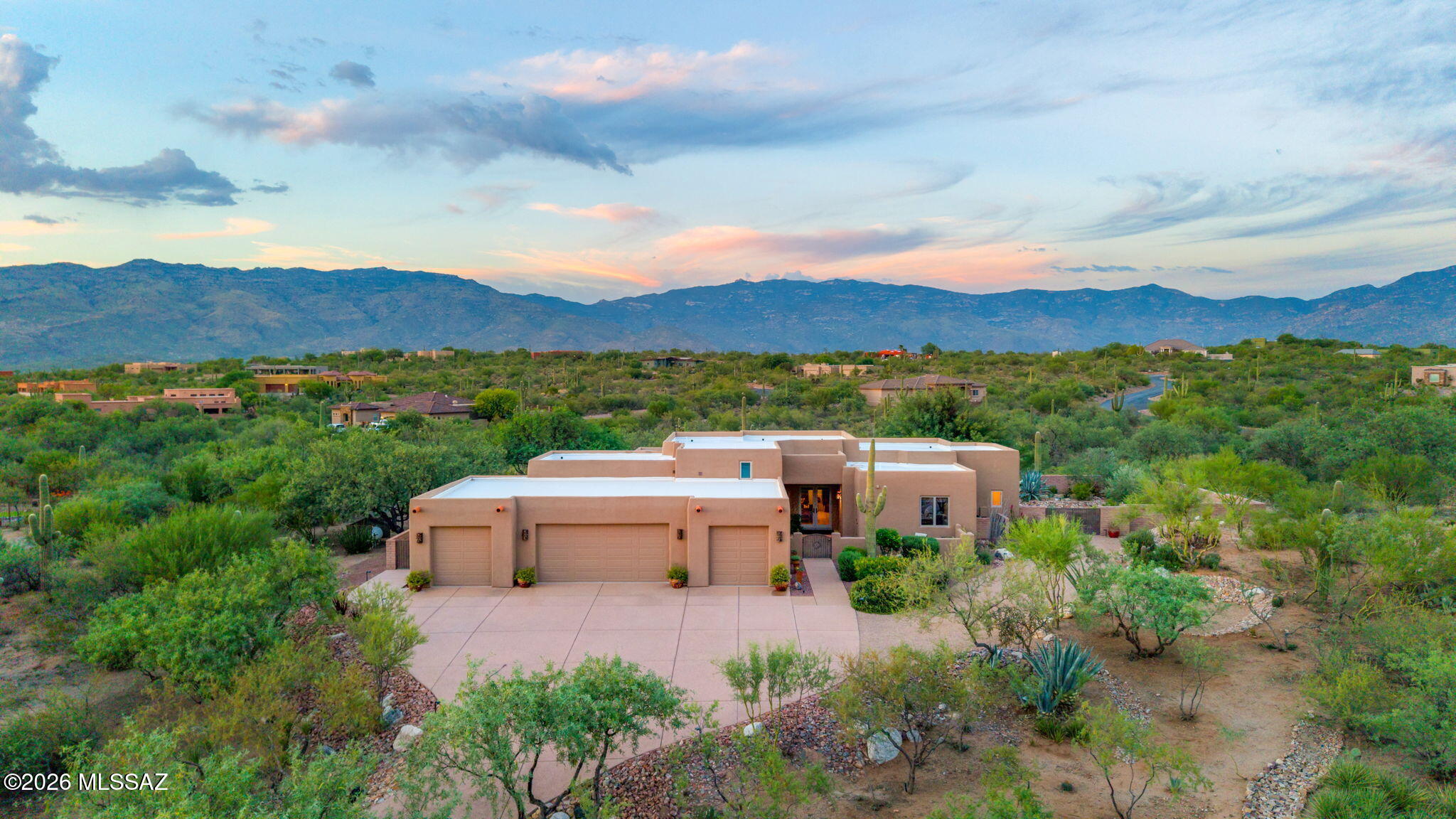 Range priced, seller will accept or counter offers within the range of $840,000-$880,000 Welcome to refined desert living in Coyote Creek. Set on 2.13 private acres with sweeping mountain views, this custom home offers 3 bedrooms, 3 baths, a 4 car garage & two spacious primary suites, each with a private ensuite. Beautiful travertine flooring, Knotty Alder cabinetry & doors, Andersen windows with rich wood trim, & a gourmet kitchen with granite countertops and premium appliances. Expansive windows capture stunning desert and mountain views the second you walk in, while the beautifully landscaped backyard creates a private oasis for relaxing and entertaining. With stunning sunsets and painted skies, the views inside the home are so much more expansive than pictures can show! More... True desert beauty is up close and personal once you walk in and see the mountains. 

The front porch area was added in 2026 and the backyard was doubled in size with the side yard being added onto in 2026 also. The front and front side yards have been landscaped with decorative rock added and desert landscaping to maximize on views and privacy. The backyard also boasts a plum tree, a lemon tree and a fruitless olive tree. Enjoy the serenity and views with a gas grill and flat top grill, perfect for relaxing evening meals outside.

A standout feature is the rare oversized 4-car garage, offering exceptional space for vehicles, toys, storage, a workshop, or a personal gym. 

Another great feature is the 12x12 attic with pull-down access in the laundry room which provides even more valuable storage.

Coyote Creek offers an exceptional desert lifestyle with miles of walking, hiking and biking trails, an equestrian center with boarding, plus pickleball, tennis, basketball and volleyball courts. Privacy, views, quality craftsmanship and incredible garage space make this property truly special.