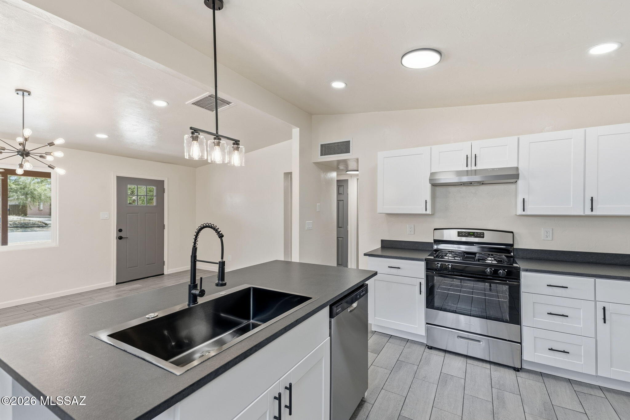 Recent Price Improvement! Live close. Invest smart. Build your future. Perfectly positioned just minutes from the University of Arizona, this beautifully remodeled 3-bedroom, 2-bath home offers the rare combination of modern living, future investment potential, and one of Tucson's most convenient central locations. From the moment you arrive, you'll appreciate the fresh renovations and move-in-ready condition, allowing you to spend less time on projects and more time enjoying everything Tucson has to offer. Whether you're a first-time buyer, University of Arizona employee, parent purchasing for a student, or investor seeking a high-demand rental, this property delivers flexibility for today's lifestyle and tomorrow's goals. The R-2 zoning with NO HOA creates an exciting opportunity to add an Accessory Dwelling Unit (ADU) (subject to City of Tucson approval), opening the door to additional rental income, a private guest house, multigenerational living, or a home office designed around your lifestyle.
Imagine biking to campus, catching dinner on Fourth Avenue, exploring Downtown Tucson's restaurants and nightlife, cheering on the Wildcats, or enjoying an easy commute to Banner University Medical Center--all just minutes from your front door. Weekend adventures, local coffee shops, parks, and entertainment are always within reach, making this location as desirable as it is convenient. Whether your goal is to build wealth through real estate, create a home with room to grow, or own a beautifully updated property in one of Tucson's strongest rental corridors, this  location offers an opportunity that's difficult to find.
Enjoy Modern updates, Prime location, and all the Future possibilities this property has to offer.