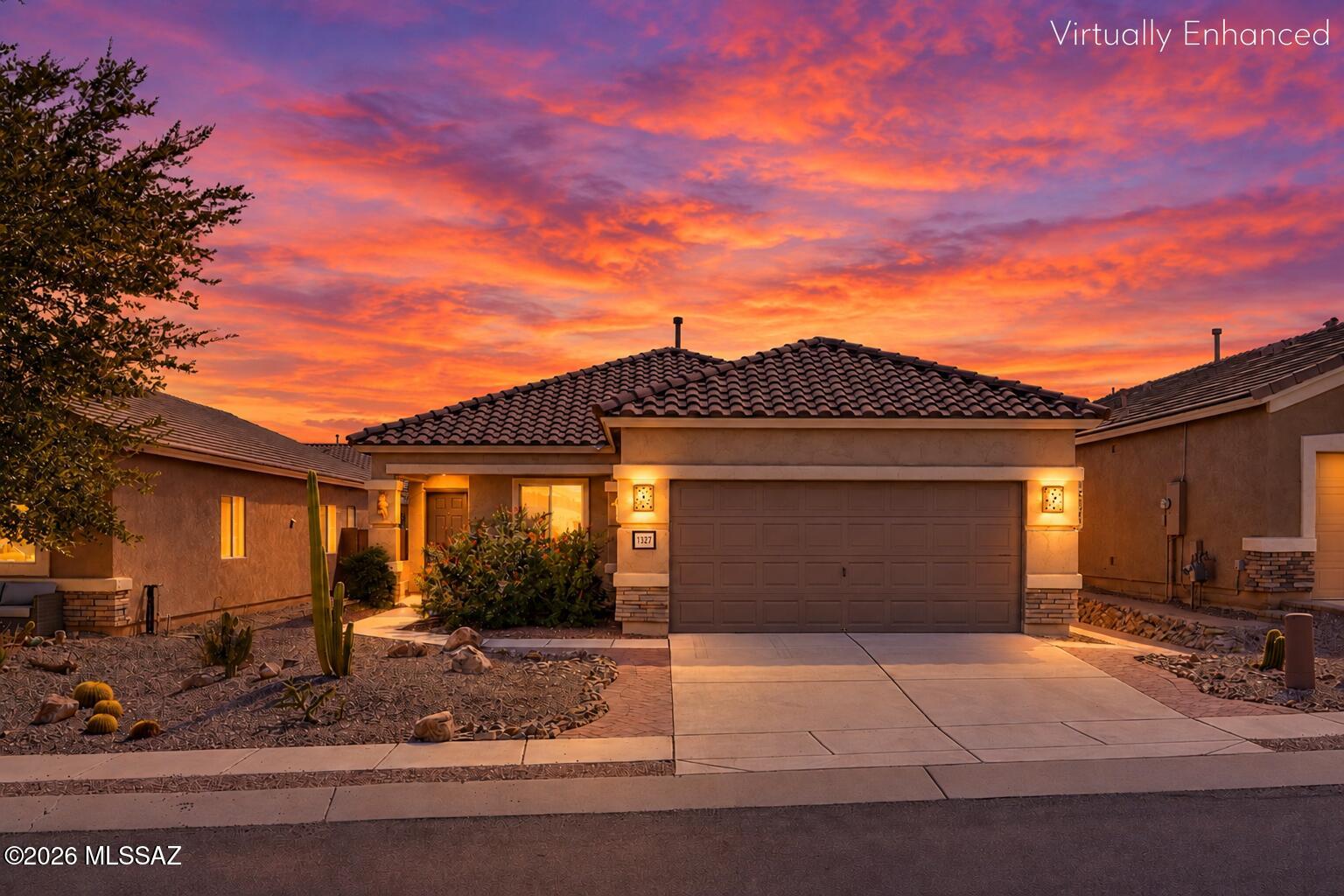 Welcome to easy Arizona living in Rancho Resort, a gated 55+ active-adult community in Sahuarita. This beautifully maintained 2-bedroom, 2-bath home offers 1,251 sq. ft. of comfortable living space, thoughtful upgrades, and a truly move-in-ready opportunity for full-time or seasonal living. Major improvements provide added peace of mind, including a 2026 tile roof underlayment replacement featuring PolystickÃ‚Â® TU MAX self-adhered underlayment with a transferable warranty, a Bradford White gas water heater installed in 2025, and an updated A/C condenser from 2021. Inside, you'll find easy-care tile flooring throughout, granite tile countertops, stainless steel appliances, a gas range, and an oversized Samsung washer and dryer set with storage pedestals. A rare 4-foot garage extension provides valuable additional space for storage, hobbies, a workshop, or golf cart parking. Step outside and discover what truly sets this property apart. Situated on one of the deepest lots in Rancho Resort, the backyard extends approximately 72 feet from the roofline to the rear block wall, creating an exceptional amount of outdoor space. Mature orange and grapefruit trees provide shade and seasonal fruit, while established irrigation and garden space make it easy to enjoy the Arizona outdoor lifestyle. A custom-tiled area with an in-ground spa-ready site and existing underground electrical conduit offers even more potential to create your own private backyard retreat. Rancho Resort residents enjoy a year-round heated pool and spa, clubhouse, fitness and recreational amenities, and an active social calendar, all within a beautifully maintained gated community. Conveniently located near shopping, dining, medical services, and everything Sahuarita and Green Valley have to offer. With its recent major improvements, extended garage, exceptionally deep backyard, mature citrus trees, and low-maintenance lifestyle, this Rancho Resort home is ready for its next owner to move in and enjoy.