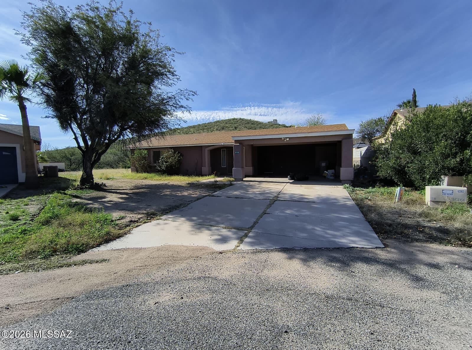 Welcome to this inviting 3-bedroom, 2-bath home with a 2-car garage in Rio Rico, offering comfort, space, and everyday convenience in a peaceful setting. The functional layout provides practical living areas ready for your personal touch, while the location places you close to local parks, schools, shopping, and dining, with easy access to I-19 for commuting to Nogales or Tucson. A great opportunity to own a home with room to grow in a well-connected Southern Arizona community. To make an offer or for more information, visit MyNextBid.com
