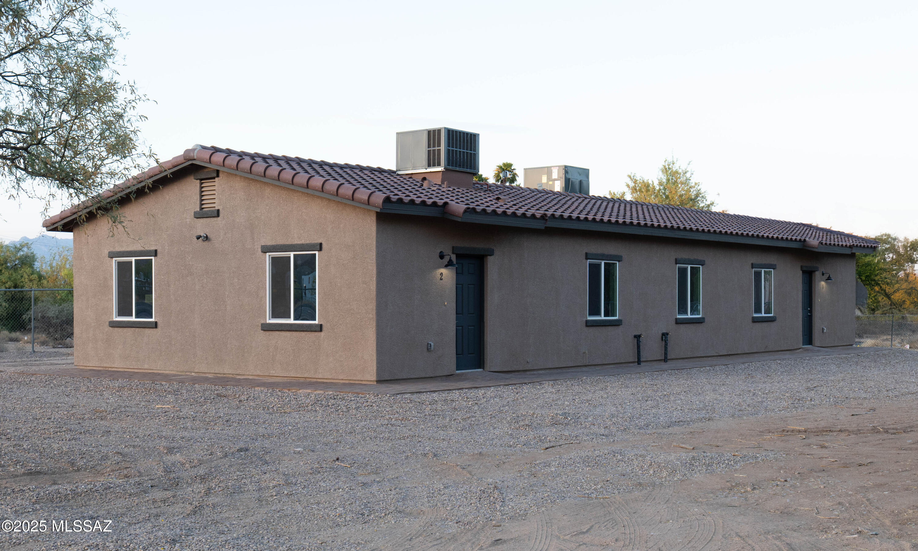 INCOME GENERATING PROPERTY * * *. * *New Construction DUPLEX . One unit 3 bedroom 2 bath - 1079 sq feet -parking space 2. 2nd Unit 2 bedroom 1 bath - 803 sq feet -parking space 2. Great Investment opportunity Or live in one and rent the other! Beautiful Granite counters through out home, new stainless steel appliances, tile in all areas. Close to the Airport and I-19 for easy commuting as well as shopping around the corner. Listing Agent related to Seller