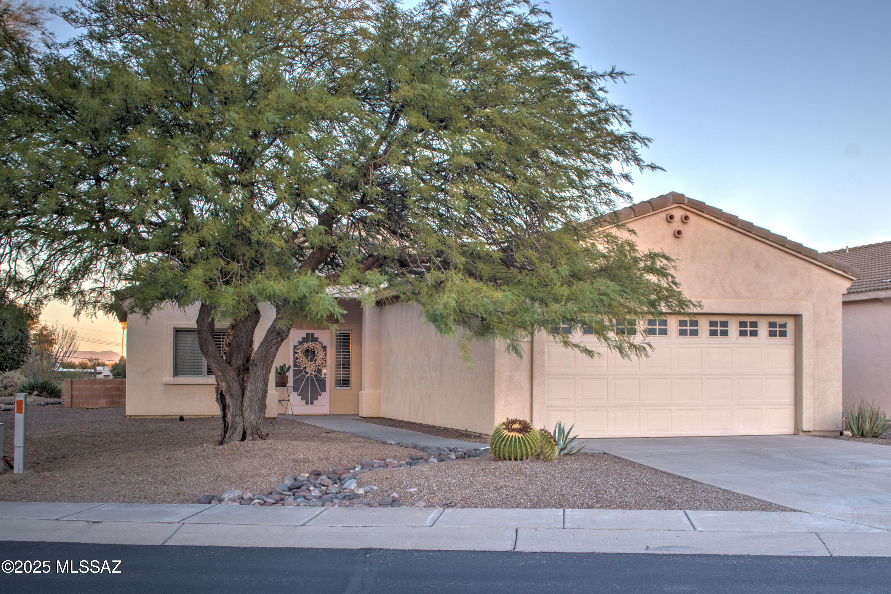 Charming property on a large corner lot, located in the gated Legends community. Property features two bedrooms, two baths plus a bonus room off the kitchen that can be used as an office, craft room or maybe a chef's pantry. The back patio is perfect for entertaining or to enjoy the sunset. Heating and Cooling System just serviced, newer tankless water softener and water heater, New roof just completed in March 2026. Waiting for you to make it your own.