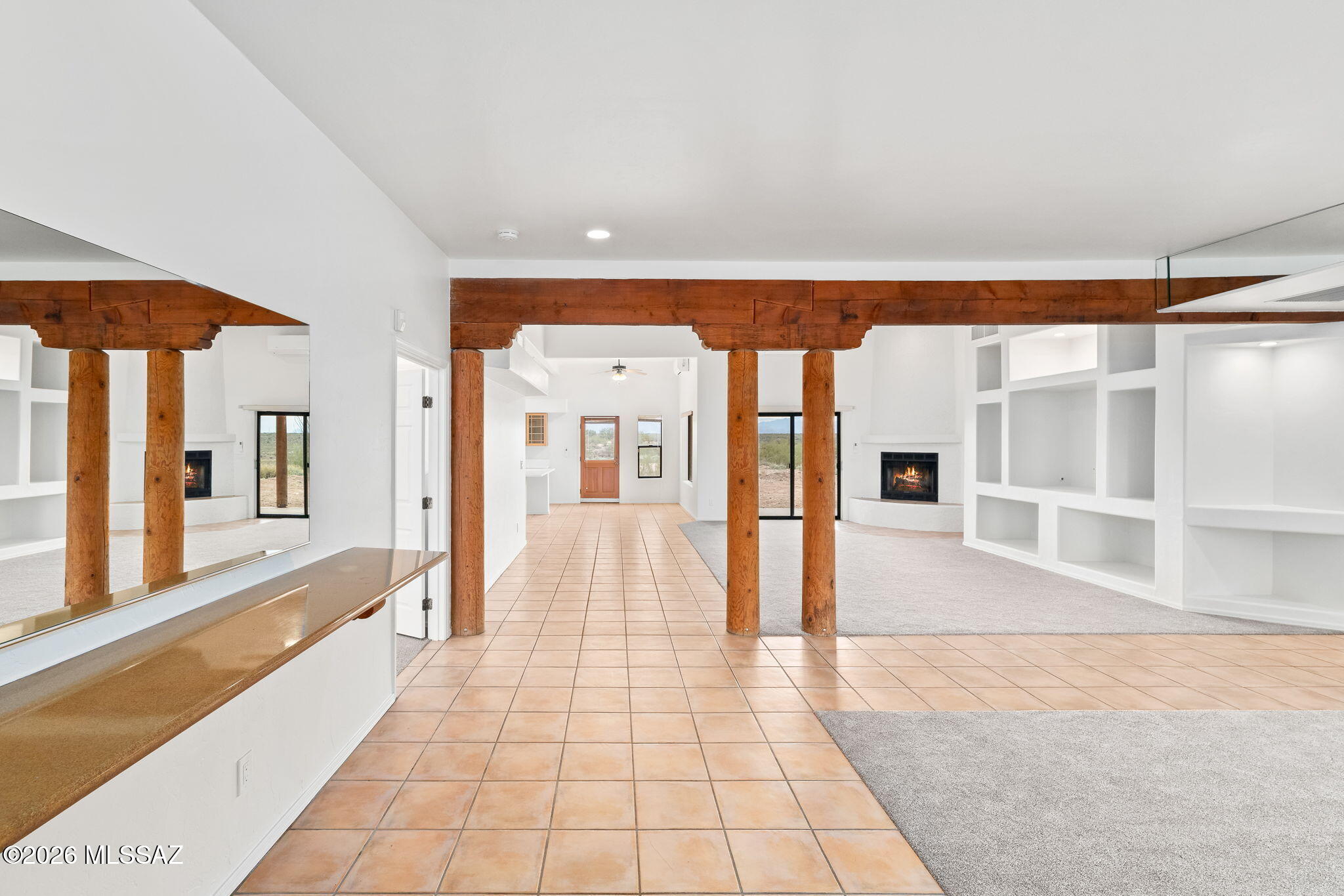 Stunning custom home on a private 5 acre hilltop lot with panoramic 360° mountain views! Located in the award-winning Vail School District, this 4 bed, 3 bath estate features a split floor plan, extra-large kitchen with island, formal dining room, and a spacious great room with a cozy wood-burning fireplace. The fully separated primary suite includes a walk-in closet, private bath, and walk-in shower.

Relax under the covered back patio and take in the breathtaking sunsets. The property includes a 10x20 attached workshop, a  3-car garage, and an owned 8.8KW solar system. Enjoy direct access to nearby horse and hiking trails and a 3-minute walk to Nelson Farms, a premier equestrian facility. No HOA. Close proximity to Saguaro National Park, Colossal Cave, Raytheon, Davis-Monthan AFB, and I-10 for a quick commute into Tucson.
(Privacy, space, and views from every room this one-of-a-kind property is a must-see!