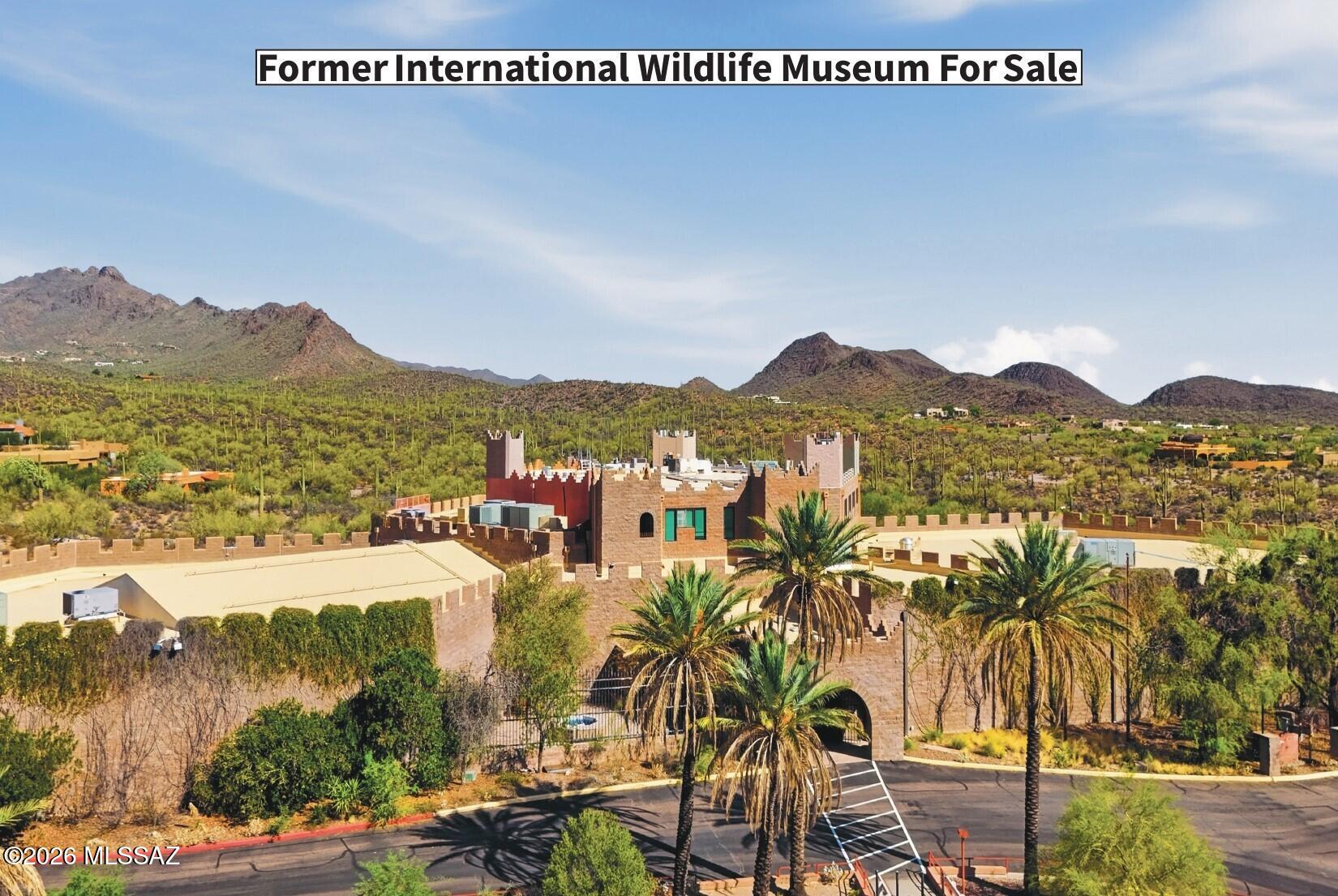 Former International Wildlife Museum, consisting of a 51,331 SF, three-story building on 11.37 acres, zoned SR. The property includes exhibit halls, a 96-seat theater, a commercial kitchen, cafeteria, classrooms, offices, workshops, storage areas, and approximately 250 parking spaces. Located near Downtown Tucson with convenient access to I-10, the property sits along the Gates Pass corridor near Tucson Mountain Park, the University of Arizona, and other major destinations.