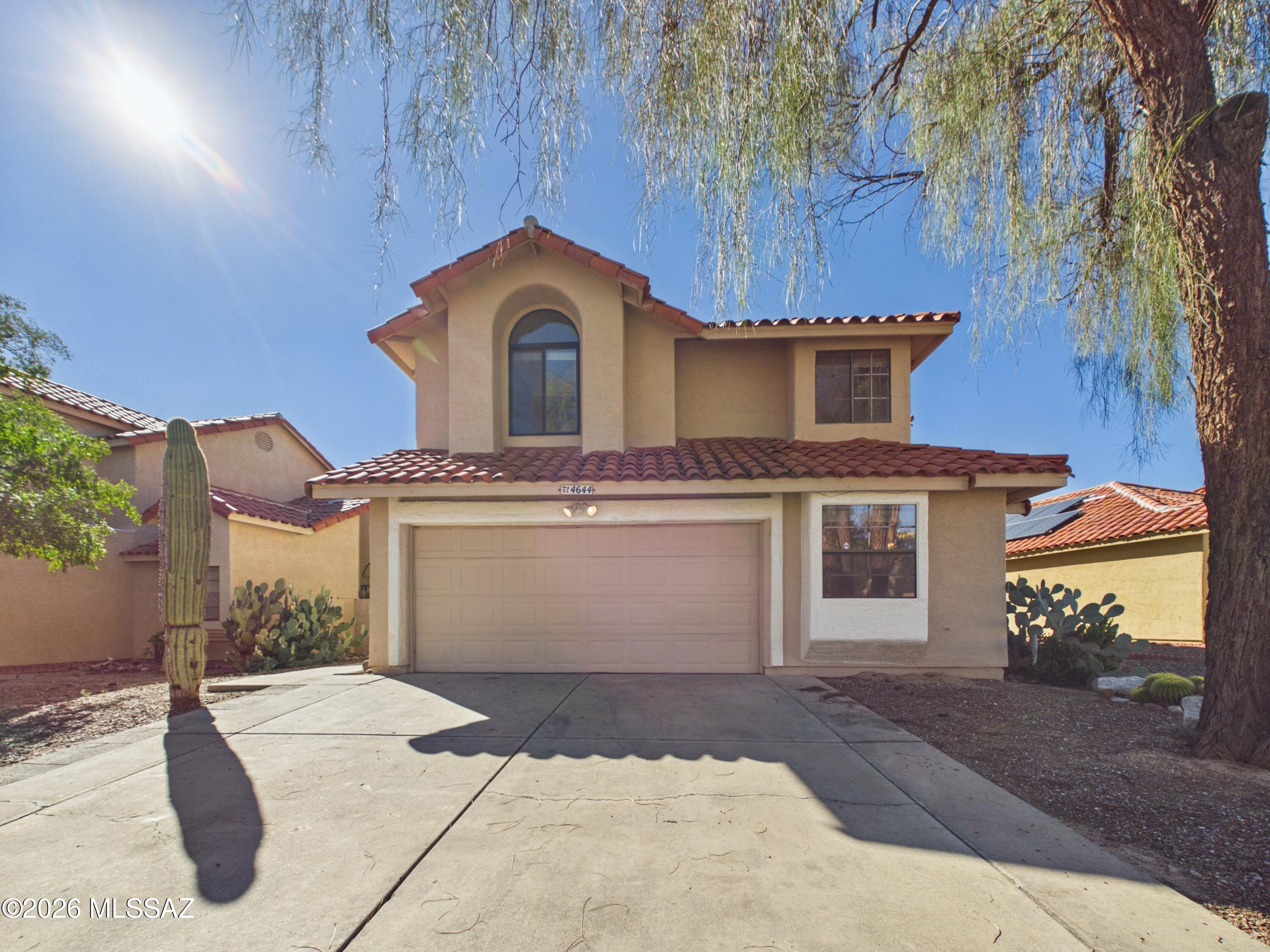 Welcome to this inviting home in the gated Countryside Valley community! The bright, open floor plan features beautiful 18-inch tile, a spacious kitchen with granite countertops, and a great room with fireplace. Upstairs, the large loft provides flexible living space and includes a closet for added storage.  Enjoy the spacious Arizona room surrounded by windows, perfect for relaxing or entertaining. The insulated 2-car garage offers additional storage.