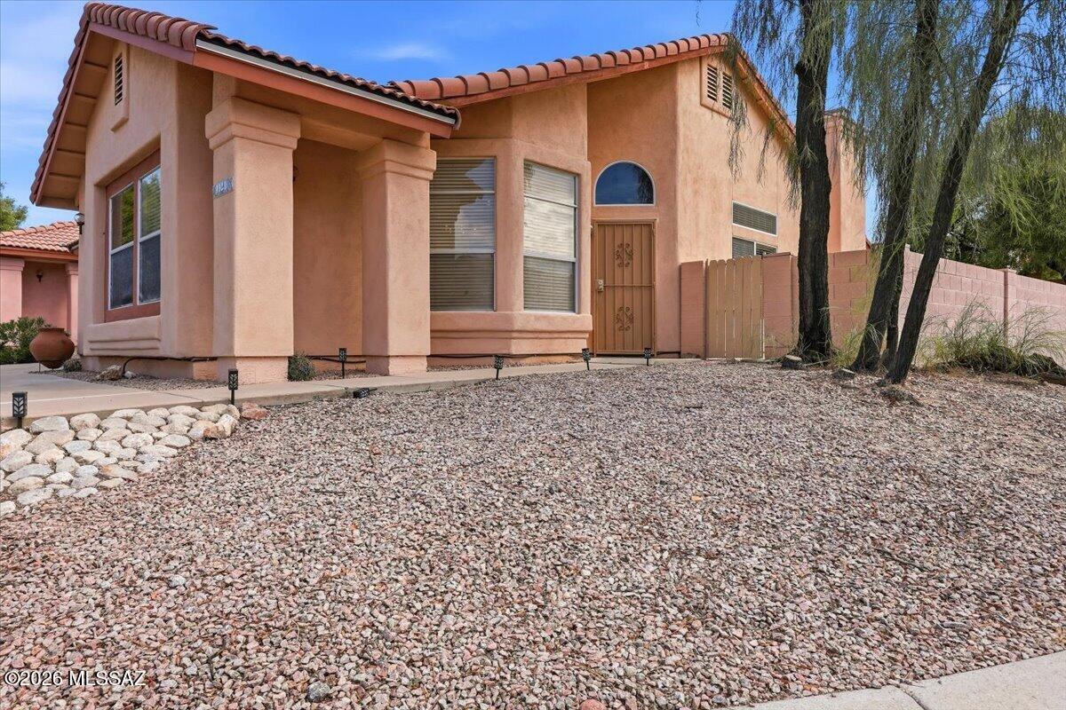 Enjoy prime suburban living with this corner-lot 3-bedroom, 2-bathroom home in the desirable North Ranch neighborhood. Perfectly situated near local schools, dining, and shopping centers, the property offers exceptional convenience. Along with a cozy wood-burning fireplace anchoring the living room. The bright kitchen is equipped with crisp cabinetry, laminate counters, and stainless steel appliances. Step outside to a welcoming backyard complete with an extended patio and low-maintenance artificial turf--ideal for outdoor relaxing. Plus, take advantage of energy savings thanks to the leased solar panel system!