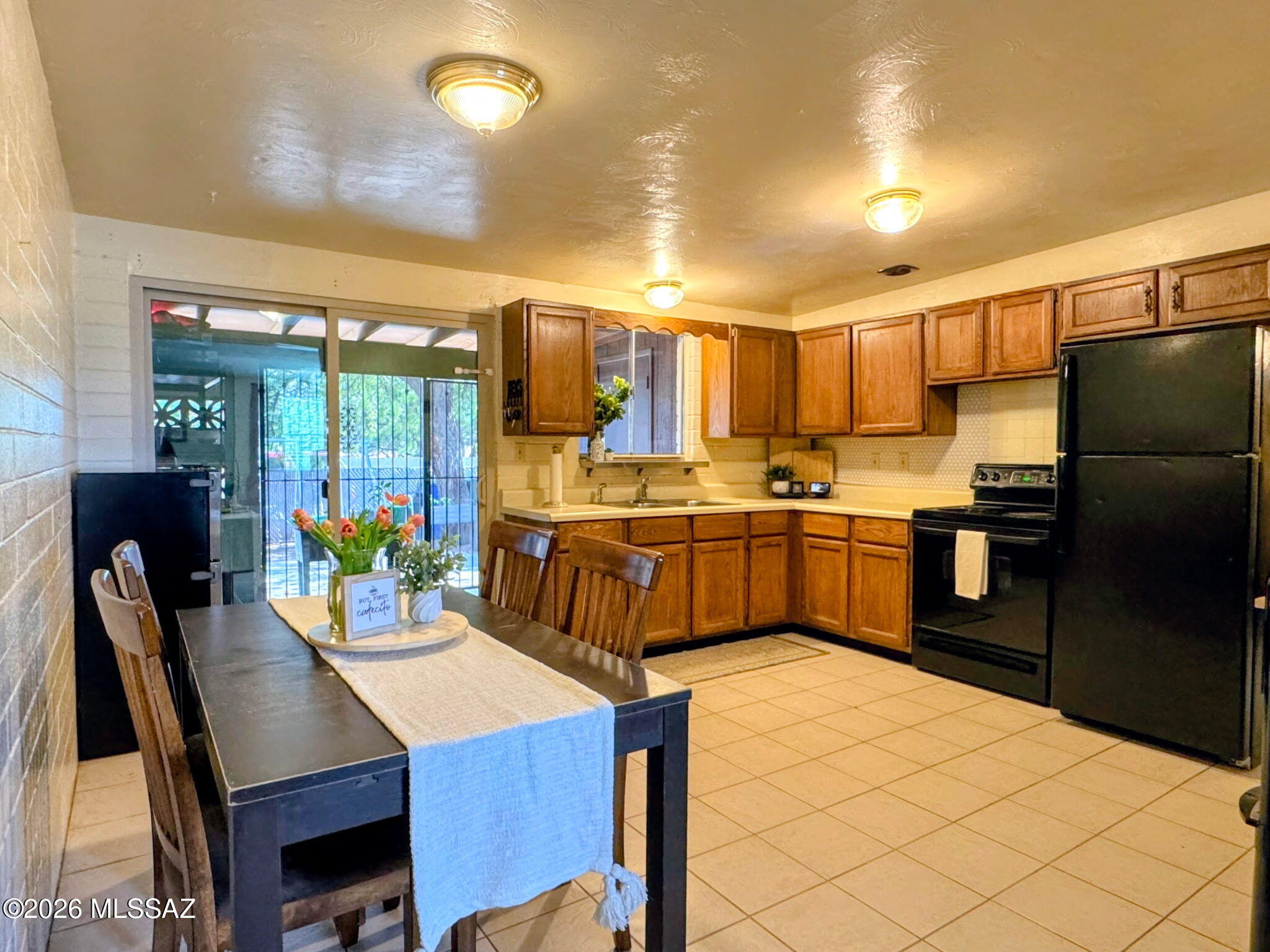 New adjusted pricing! Tucked on Tucson's desirable eastside, this move-in ready townhome offers comfort, convenience, and low-maintenance living. This rare 2-bedroom, 2-bath layout features 839 sq ft with tile and laminate flooring throughout--no carpet. Steps away from a natural walking path and Groves Park. Major updates include a new A/C, furnace, and full roof completed July 2022 for peace of mind. A dedicated laundry room adds everyday ease. Ideally located near Davis-Monthan AFB, Raytheon/Tech Park, Lincoln Park, I-10 access, and minutes to shopping, dining, and services. Perfect for a primary residence, snowbird retreat, or investment opportunity--easy living in a well-connected location. *2.875% Interest Rate on the current FHA loan is assumable for qualified buyers!*