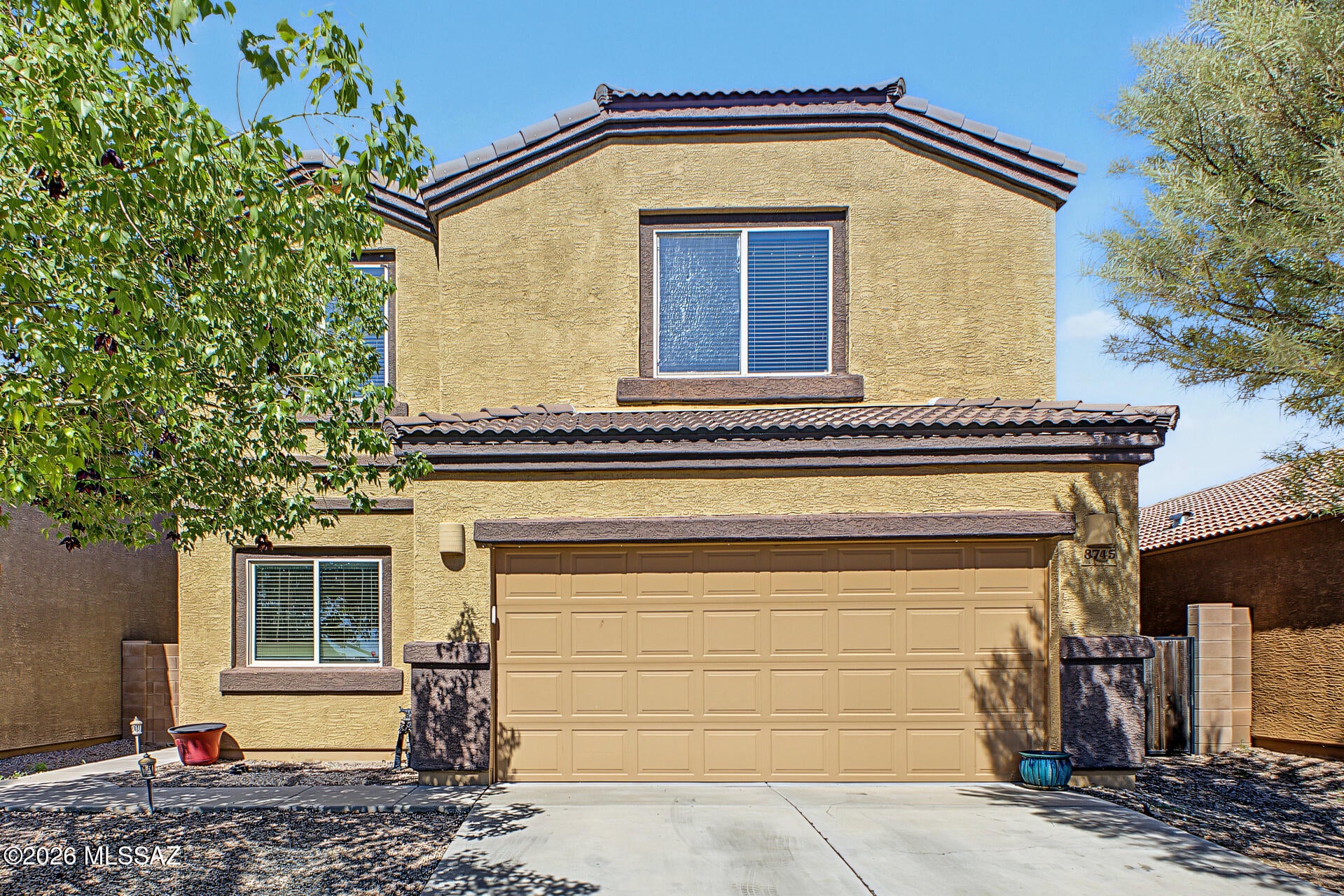 Located in the gated Pines II community, this two story home offers 4 bedrooms, 3 bathrooms and 2,173 square feet of living space. All four bedrooms are upstairs, along with a conveniently located laundry room. The kitchen features stainless steel appliances, including a Frigidaire electric range, microwave and dishwasher, an LG refrigerator and a closet pantry. A covered backyard patio provides space for outdoor dining and relaxing, while the hot tub adds a spot to unwind. The community pool is conveniently located directly across the street. A two car garage completes the home.