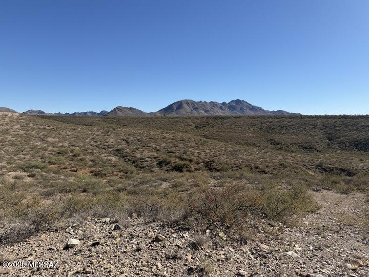 Tucked away in the scenic Tubac Foothills Ranch, this peaceful 19+ acre parcel offers privacy, quiet, and wide-open space. The gentle downhill slope and southern exposure provide excellent usability and potential building site, along with impressive views of the surrounding landscape. Underground electric is available at the lot line. Well or hauled water and septic required. A rare opportunity to enjoy serenity, space, and the natural beauty of Southern Arizona.